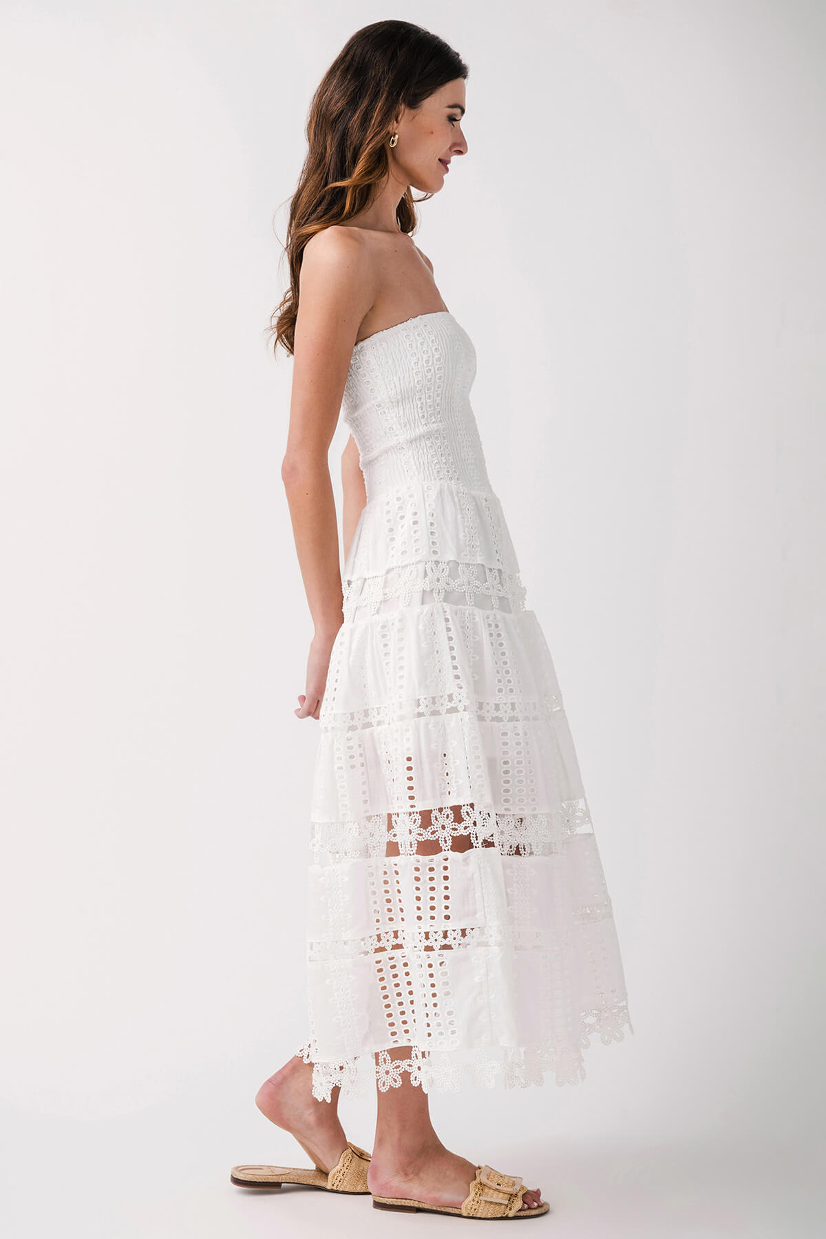 White strapless tube dress back view with tiered eyelet lace and lace hemline