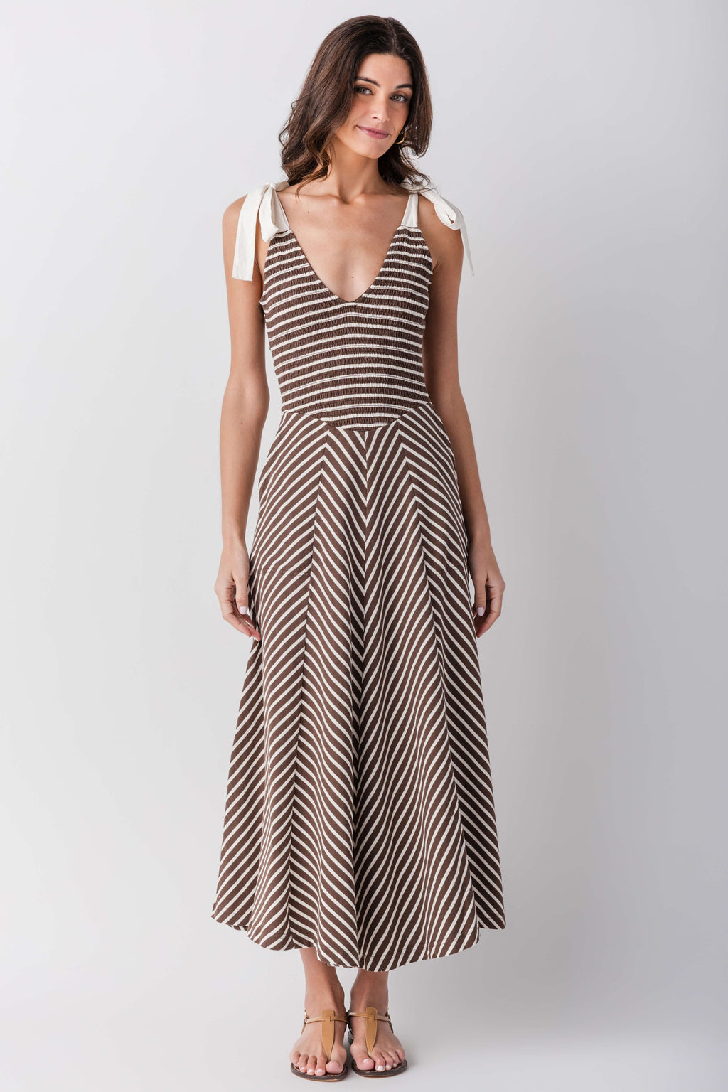 Sleeveless V-neck striped midi dress with flared skirt in cream and dark brown