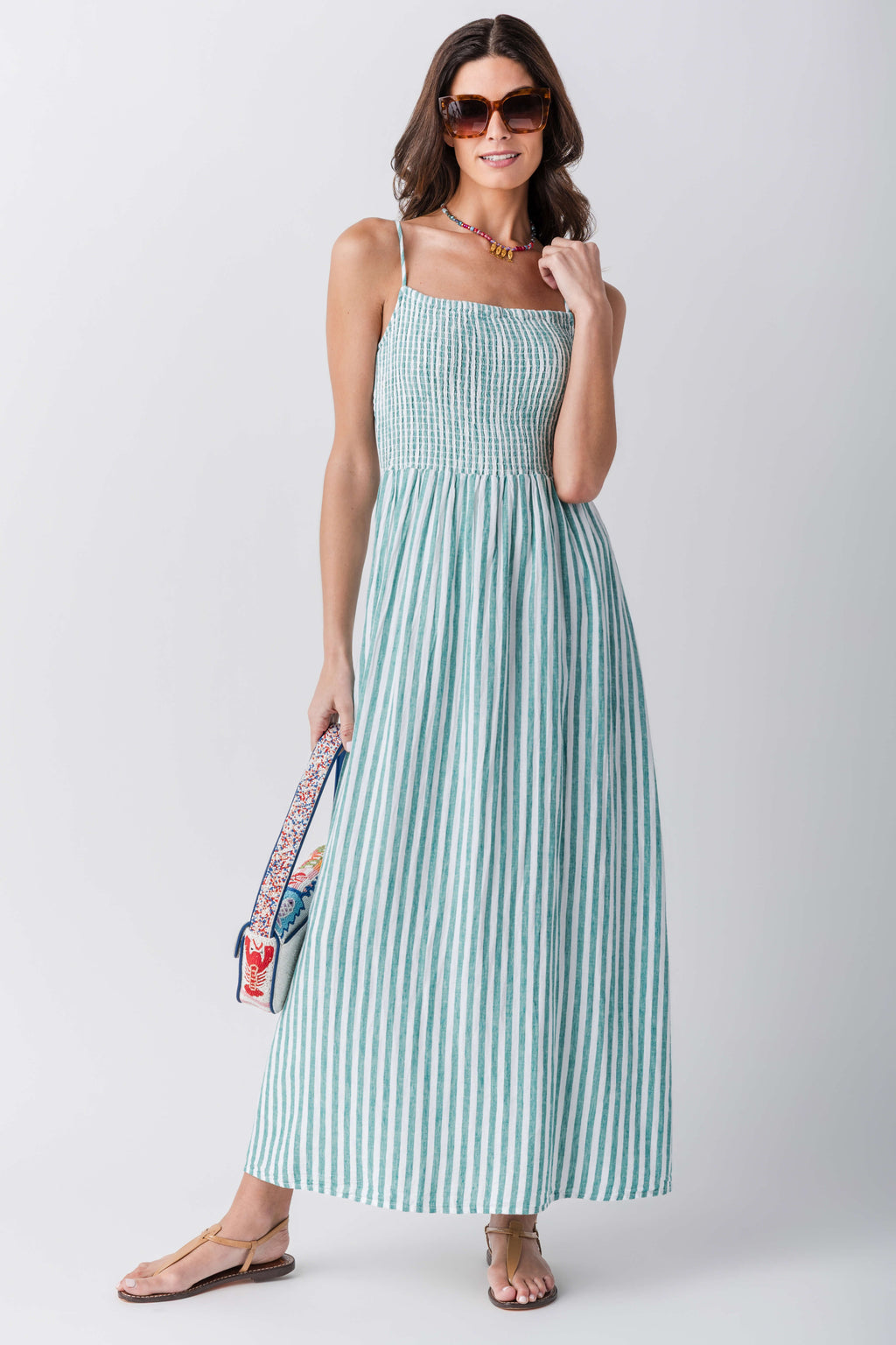 Women’s striped midi dress with square neckline, sleeveless gathered skirt in blue-teal stripes