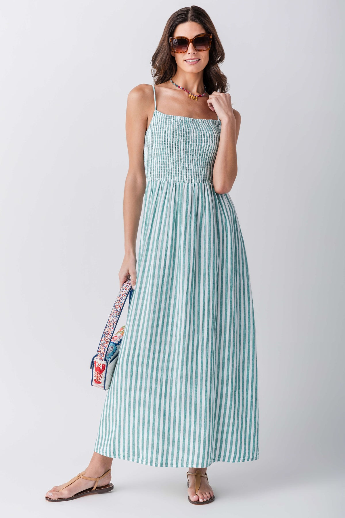 Women’s striped midi dress with square neckline, sleeveless gathered skirt in blue-teal stripes