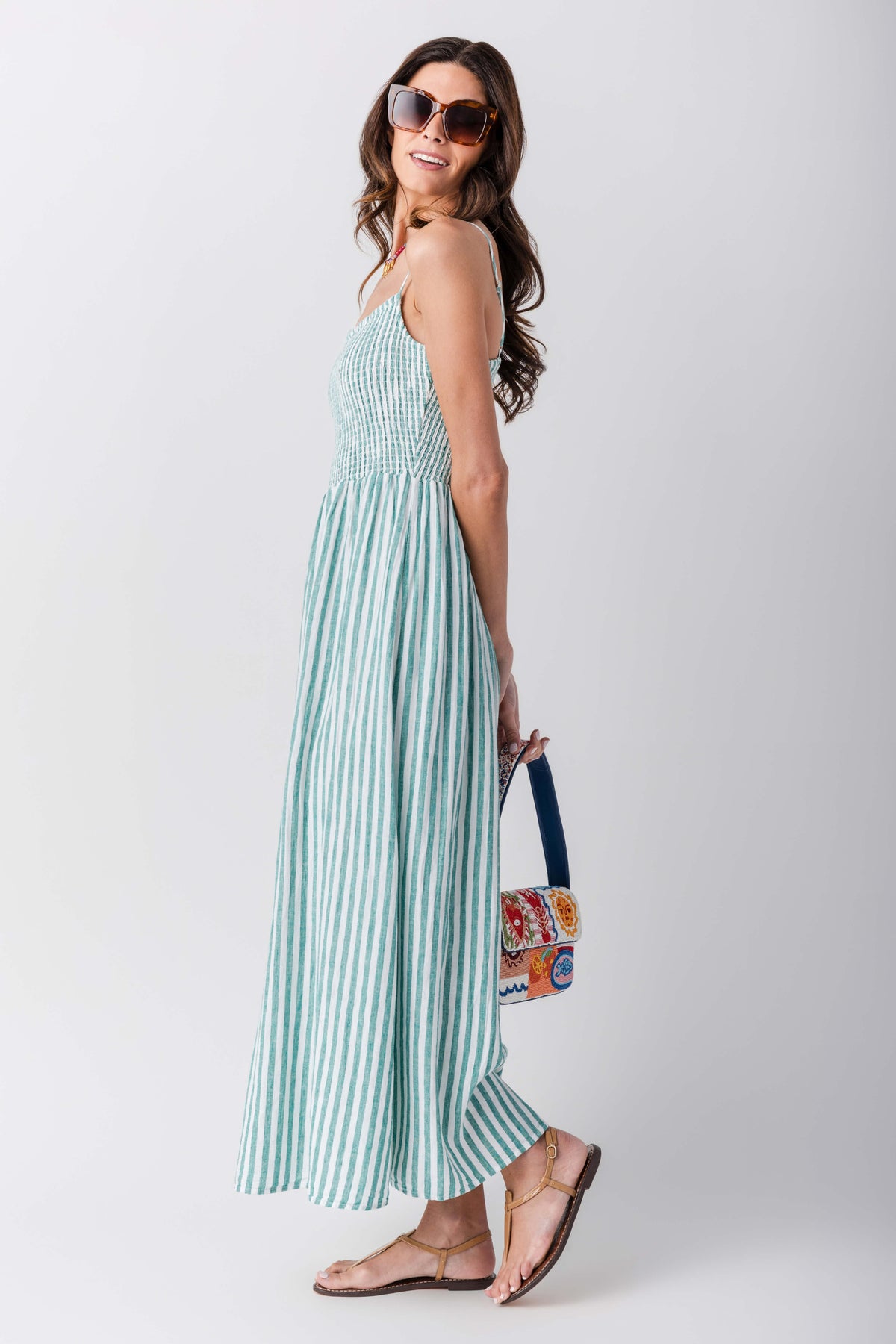 Women’s striped midi dress, sleeveless with square neckline and flowing gathered skirt, blue-teal stripes