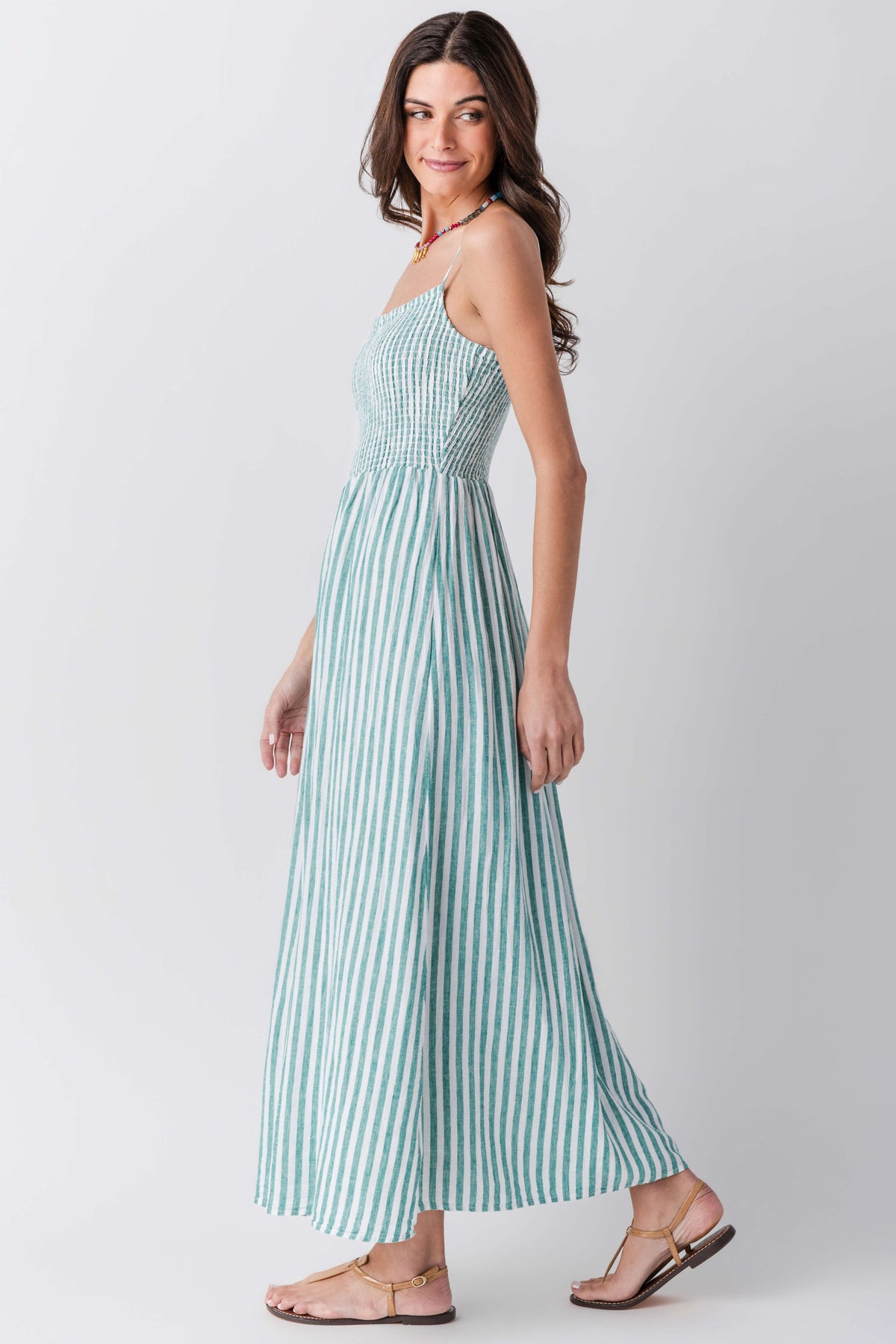 Women’s striped midi dress with square neckline and sleeveless bodice, blue-teal vertical stripes