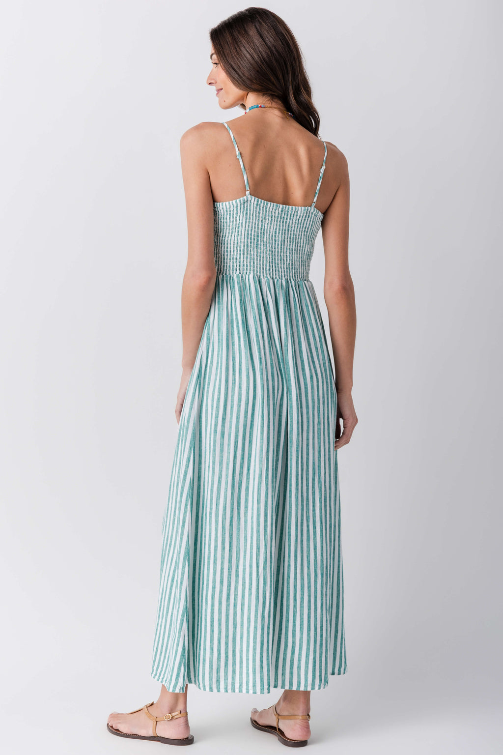 Women’s striped midi dress, sleeveless open-back design and gathered skirt in blue-teal stripes