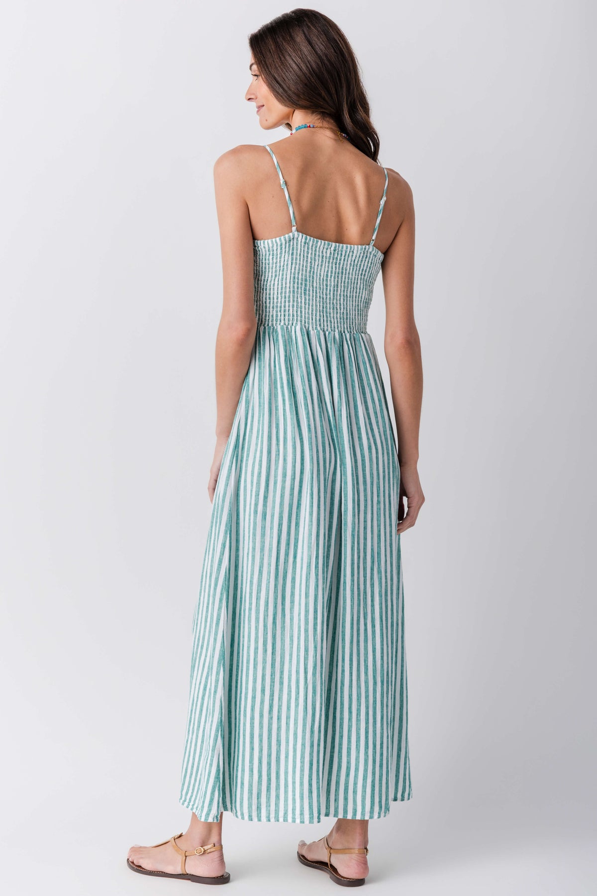 Women’s striped midi dress, sleeveless open-back design and gathered skirt in blue-teal stripes