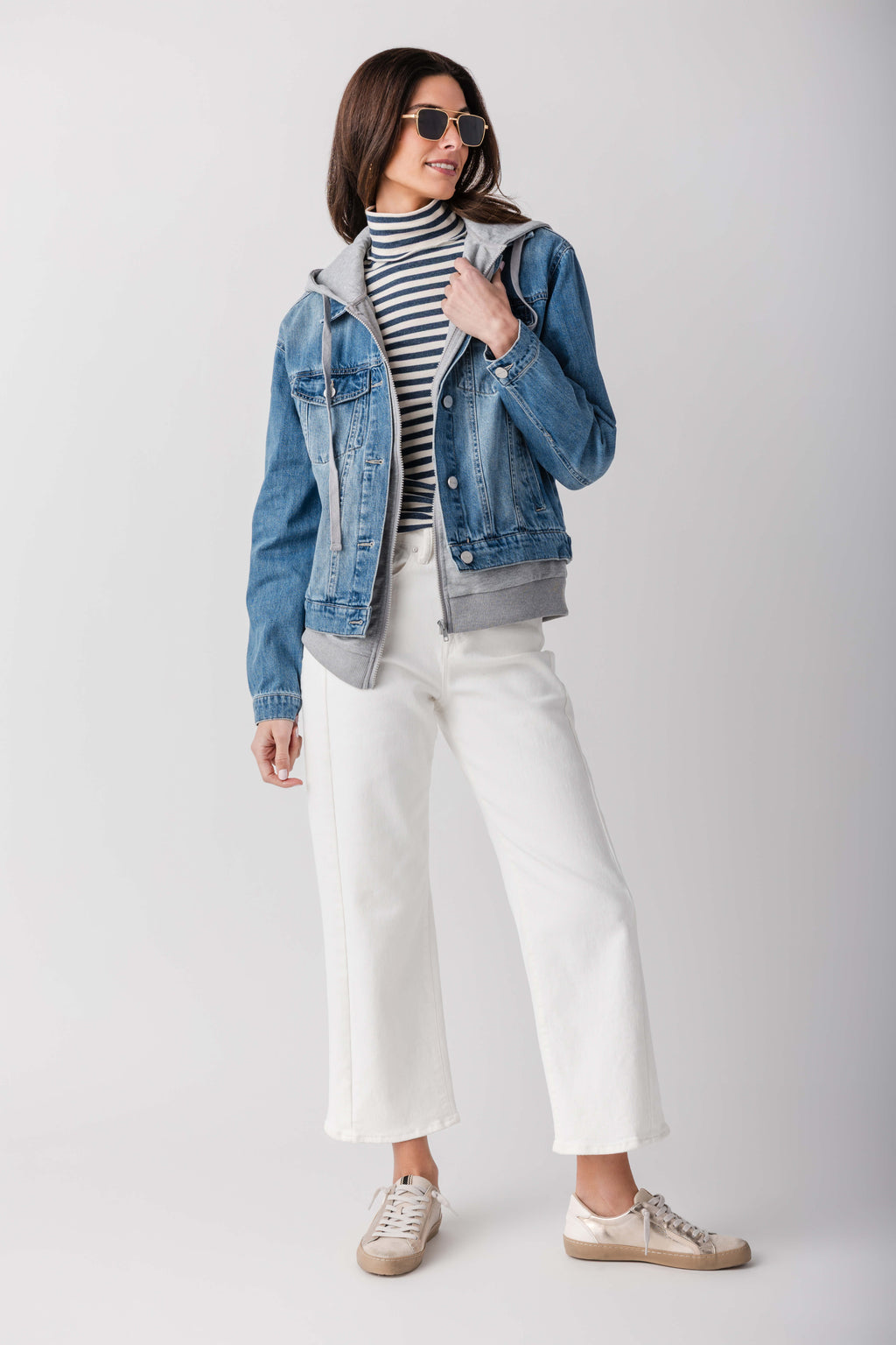 Blue denim sweatshirt jacket with hood and button front, full outfit view