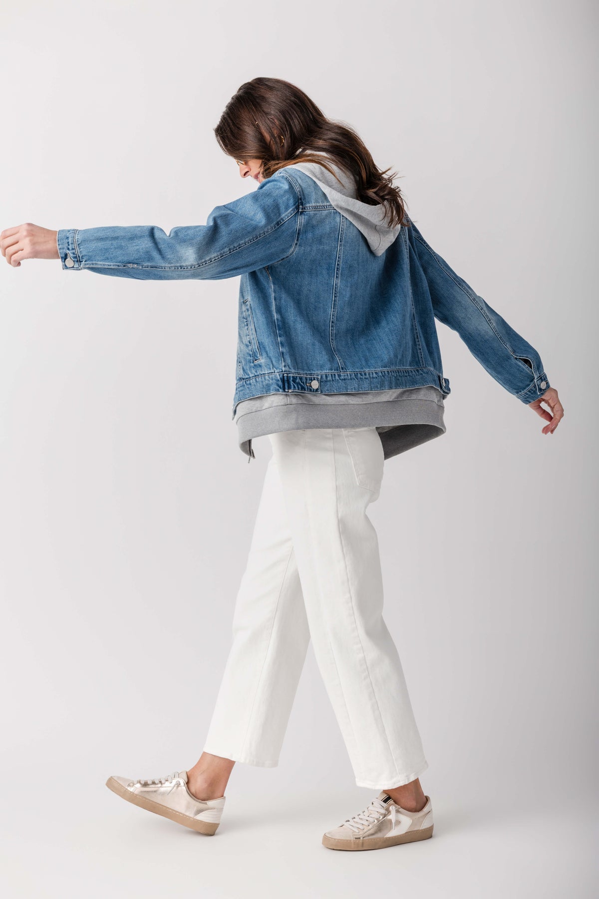 Blue denim sweatshirt jacket with gray hood, back view and ribbed hem