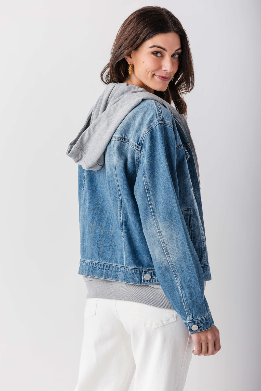 Blue denim sweatshirt jacket with hood in gray, side view, button front