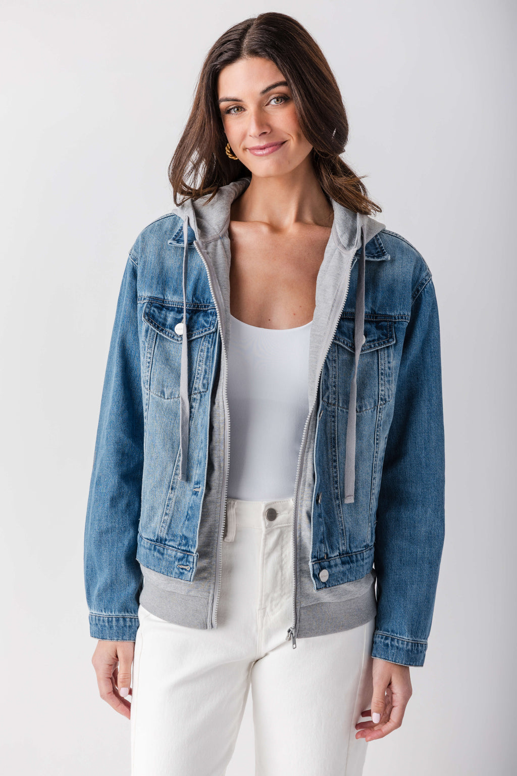 Blue denim sweatshirt jacket with gray hood, open front, and visible inner layering