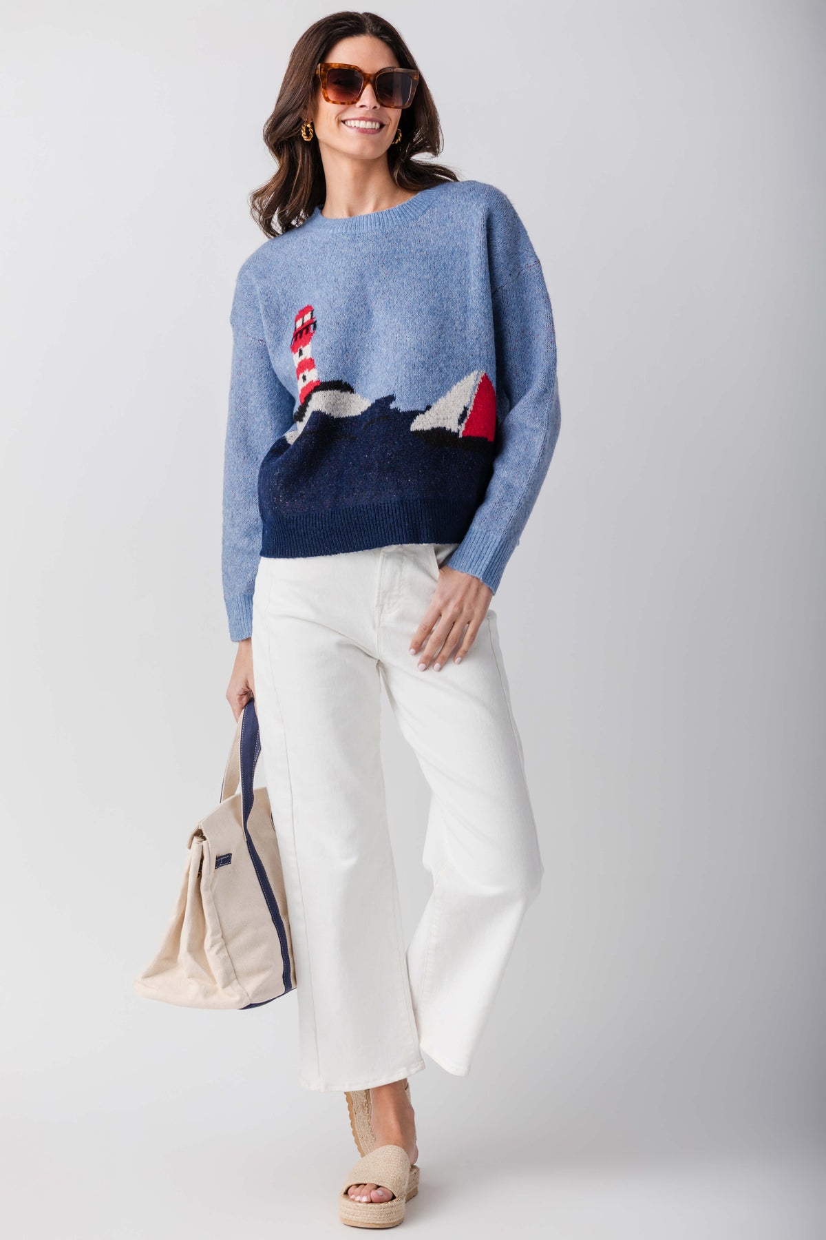 High-rise barrel jeans in white denim with relaxed barrel fit and cuffed ankle hem