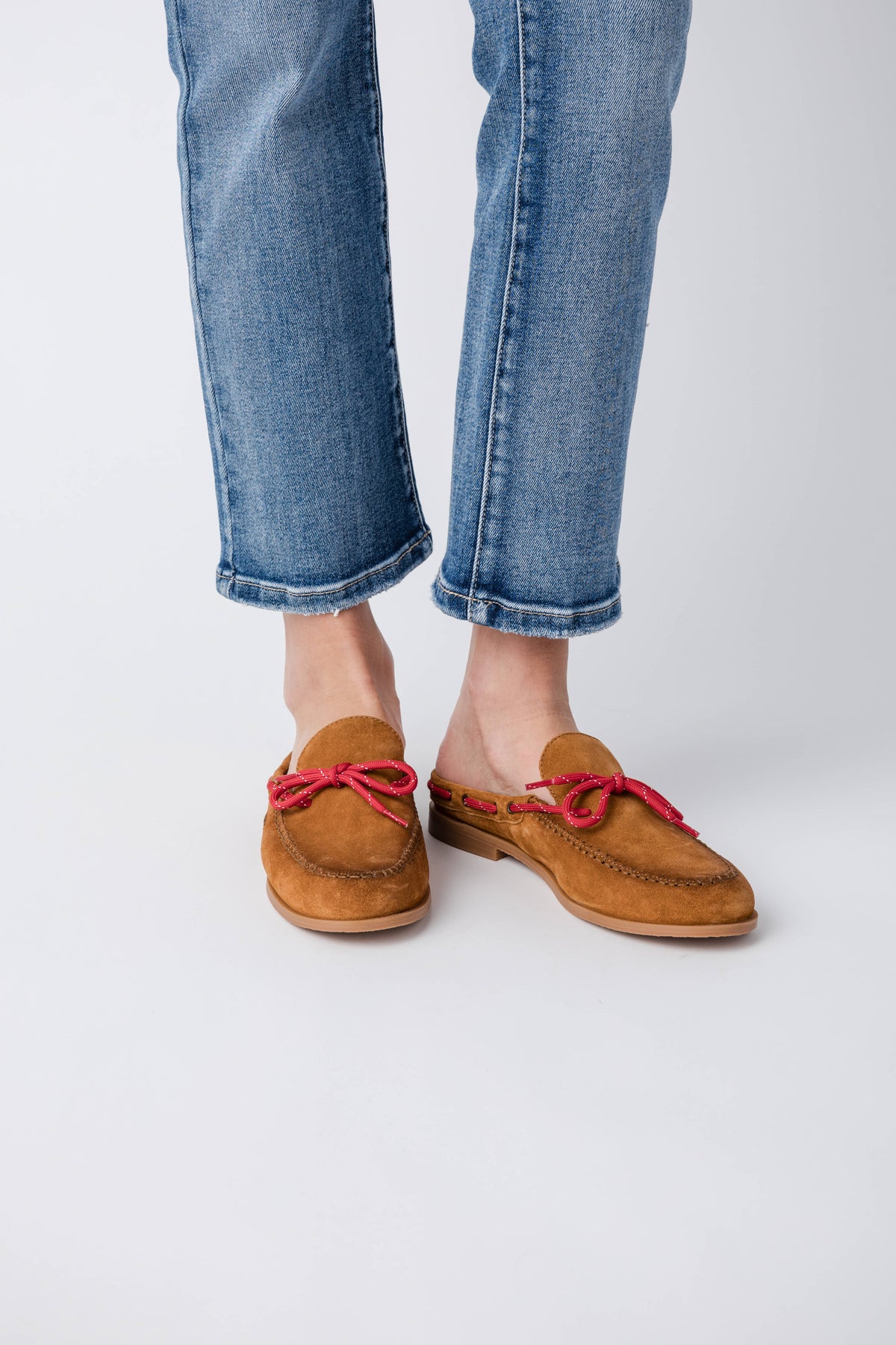 Luggage suede mule flats with red tie bow at the vamp