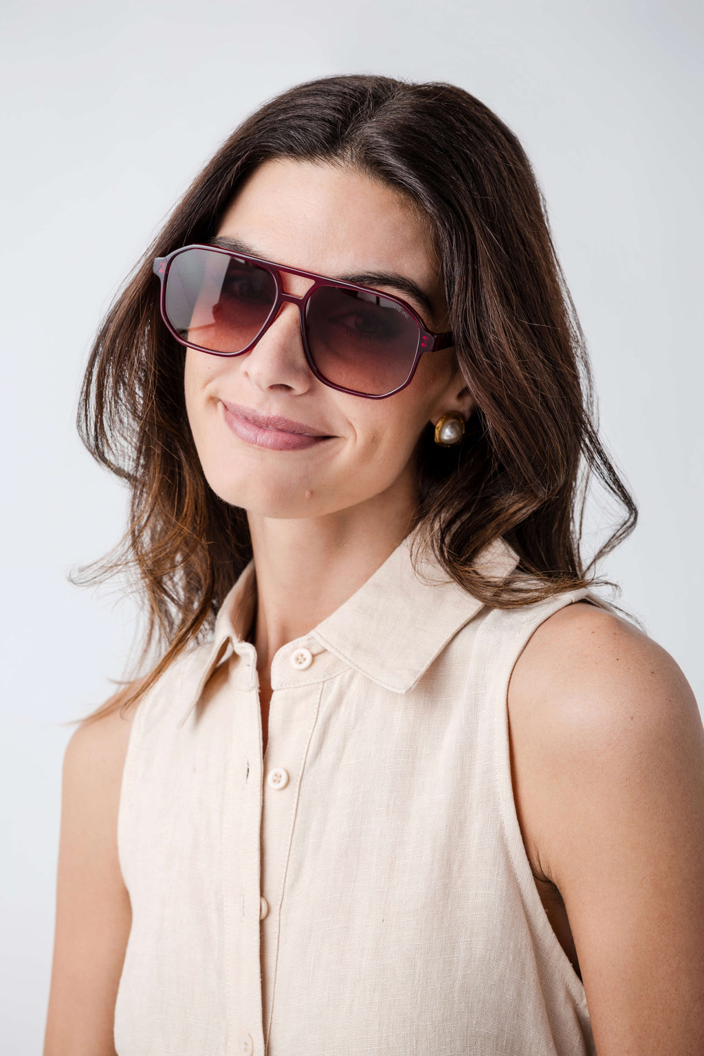 Dark cherry aviator sunglasses, side view, gradient brown lenses