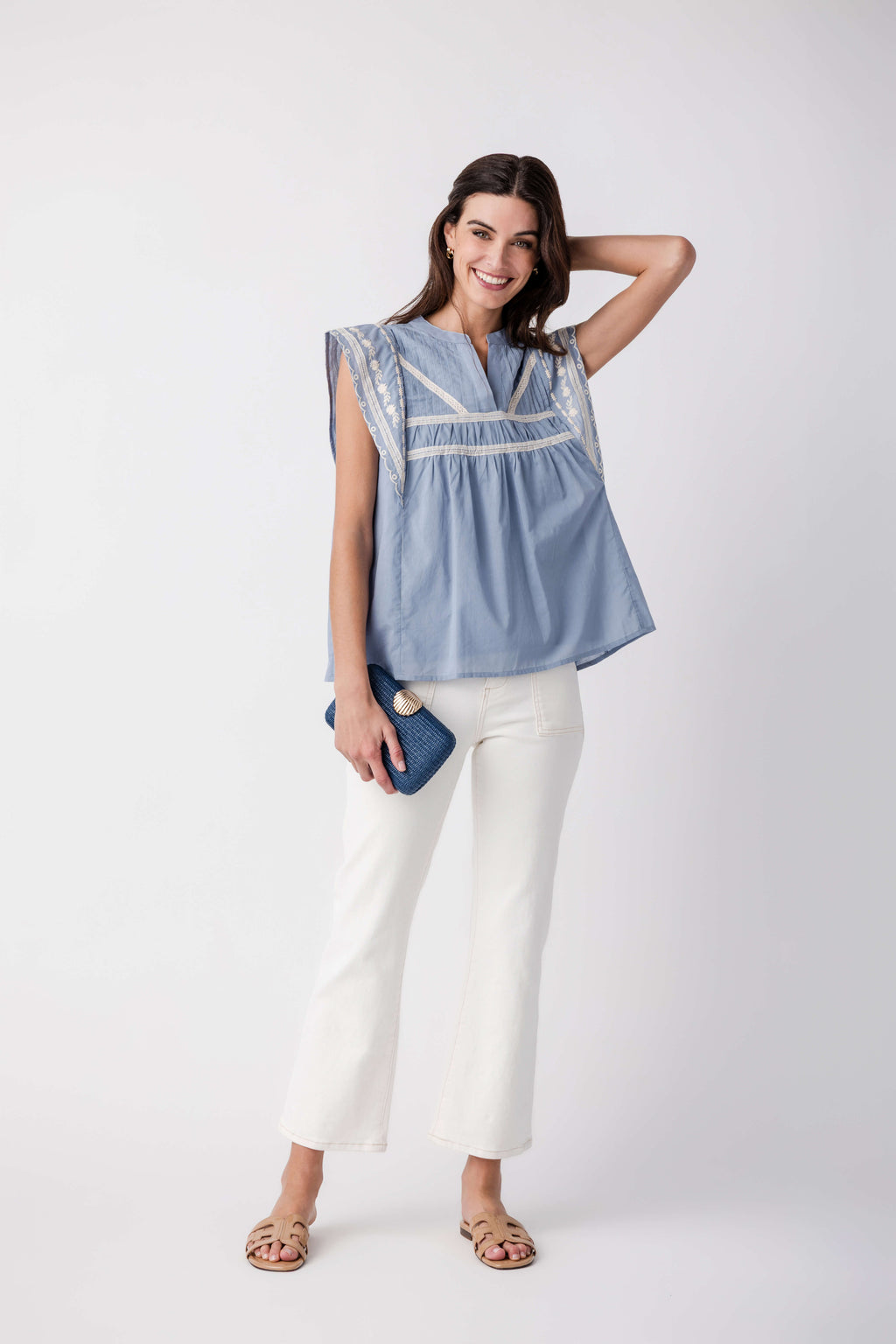 Light blue ankle flare jeans with straight-to-flared leg.