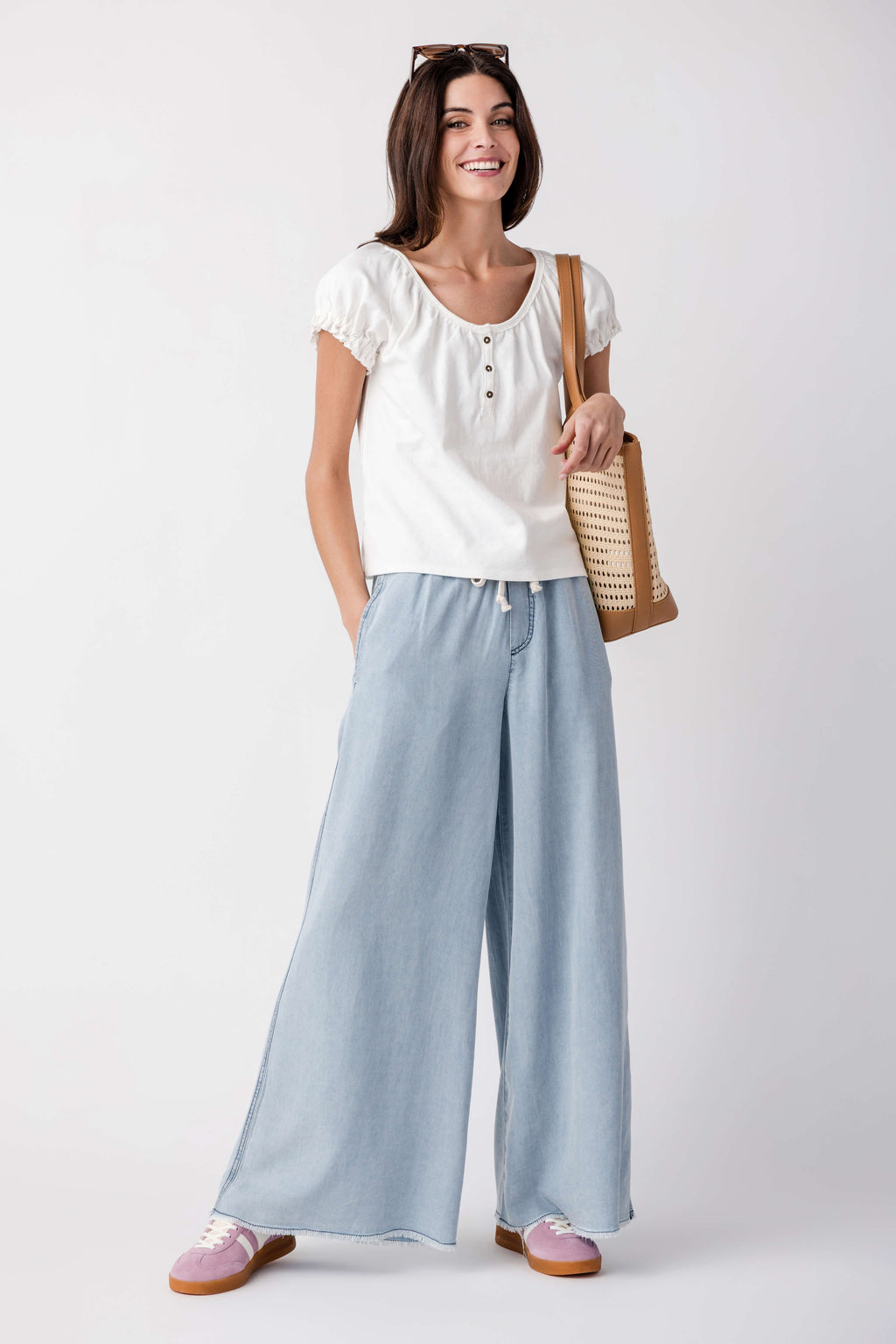 Clean ivory short-sleeve tee with button front and puff sleeves, gathered neckline