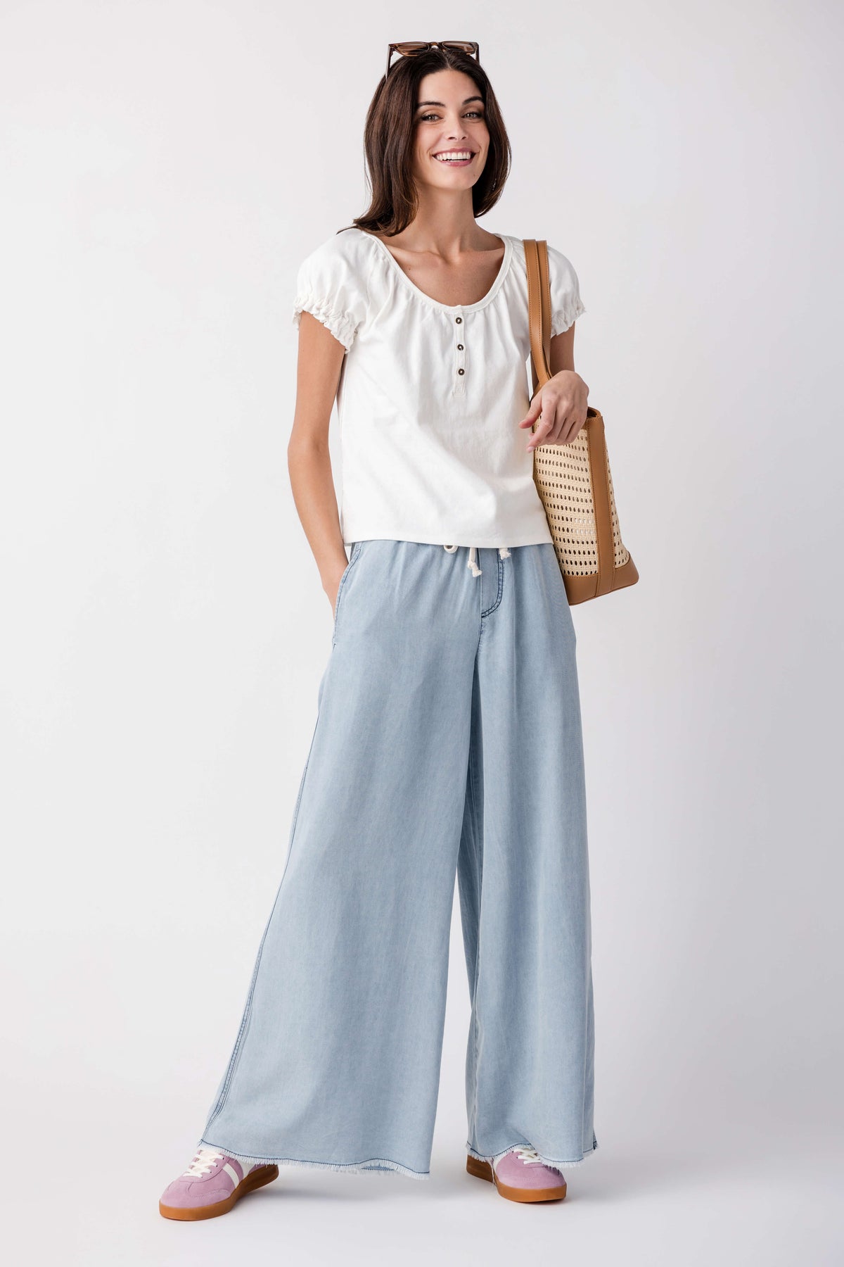 Clean ivory short-sleeve tee with button front and puff sleeves, gathered neckline