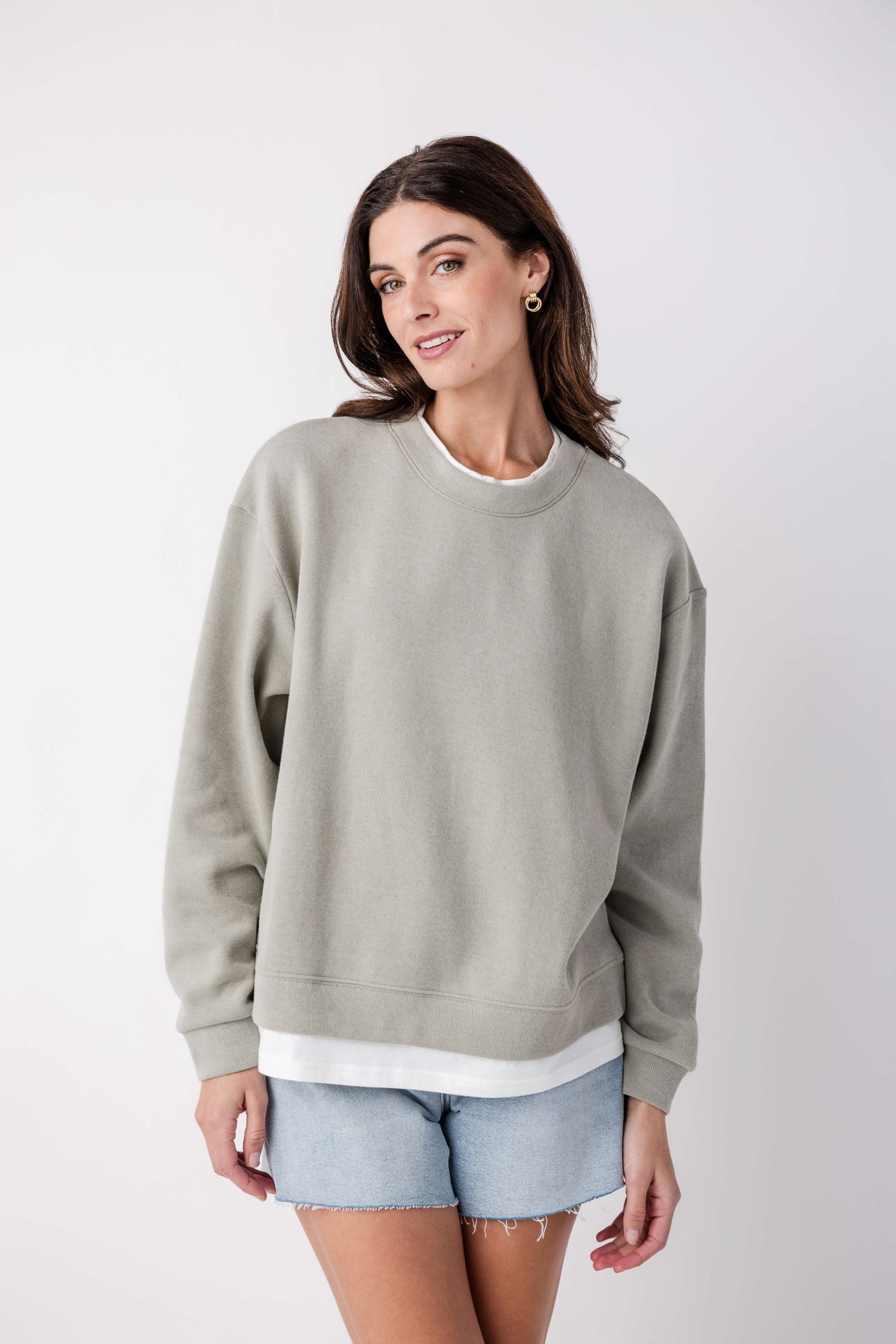 Olive-gray crewneck pullover with ribbed collar, cuffs, and hem