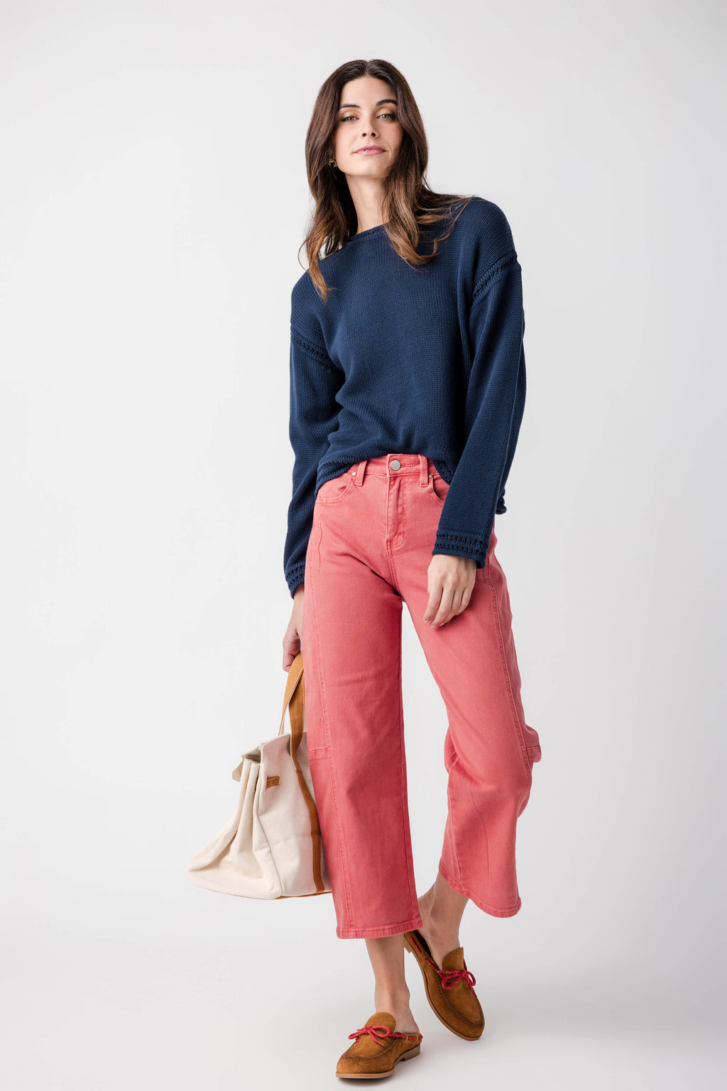 High-rise brick red crop barrel jeans, angled front view with belt loops and pocket stitching