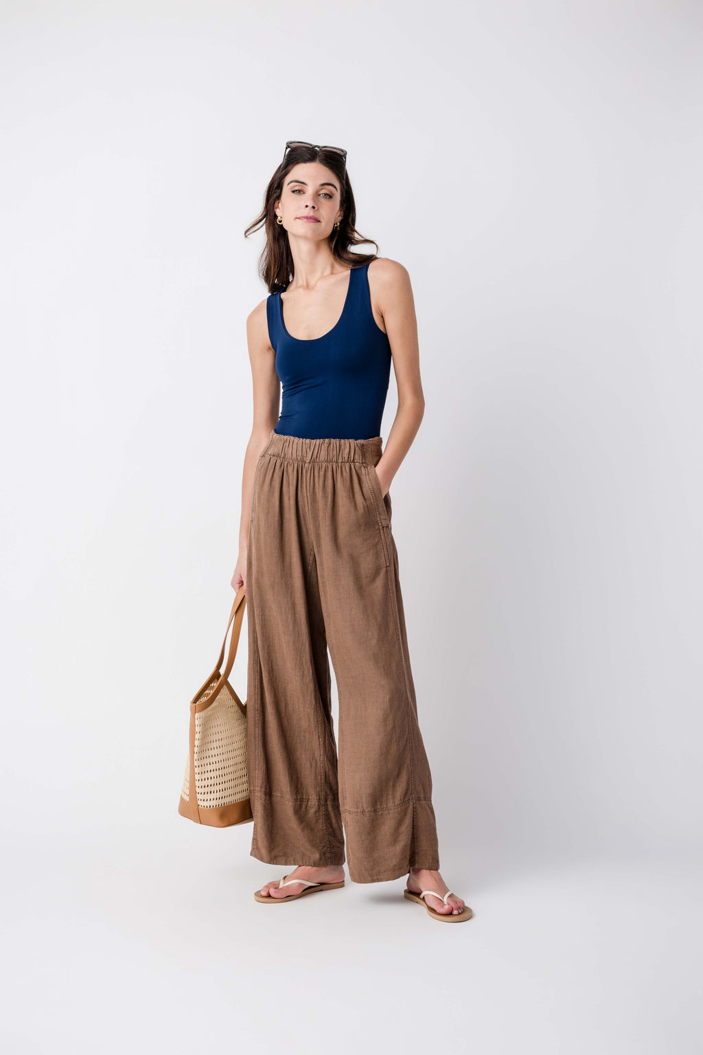 Navy scoop-neck muscle cami tank top, sleeveless fitted with clean lines