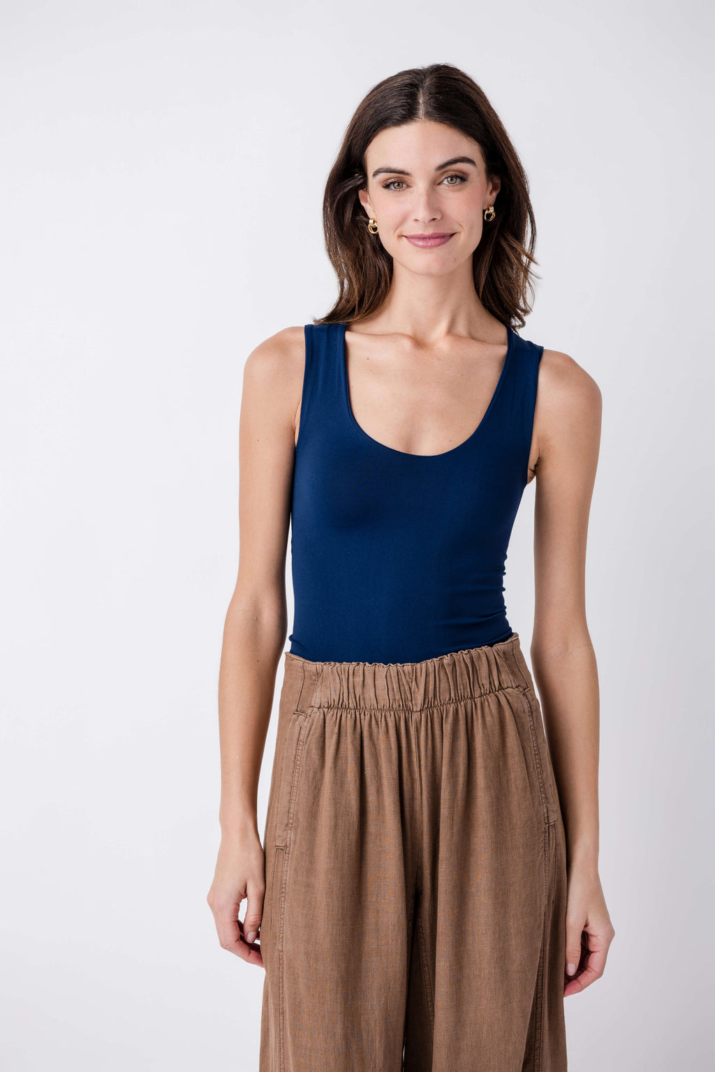 Navy scoop-neck muscle cami tank top, front view, sleeveless fitted clean lines
