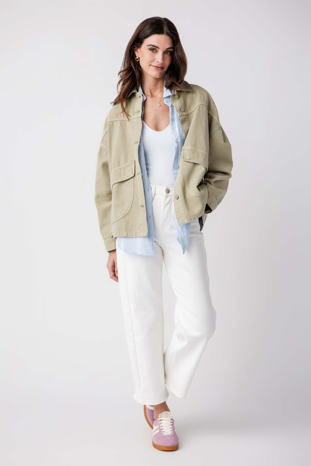 Washed sage denim jacket with button front and flap chest pockets, long sleeves