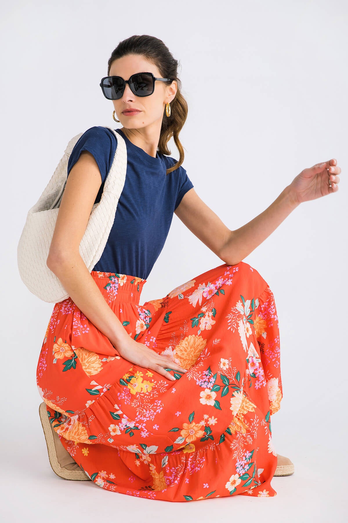 Navy modern slub tee with short sleeves and round neckline, styled with a floral maxi skirt