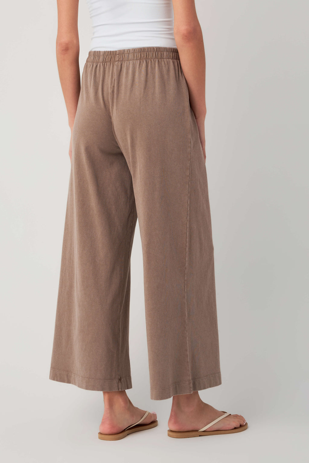 Taupe jersey crop flare pants with elastic waistband, wide cropped flare legs
