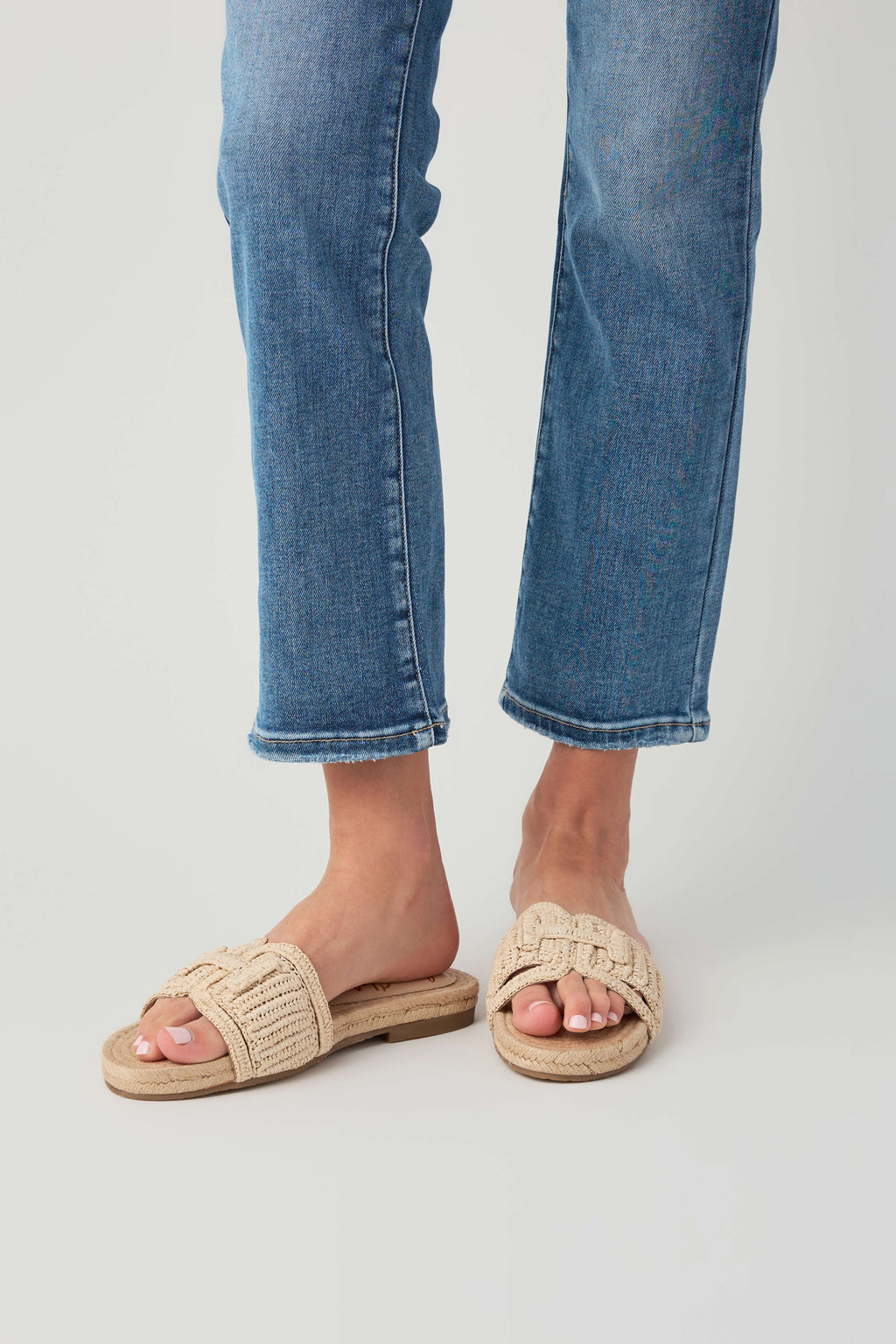 Natural woven slide sandals with open toe and braided cross straps