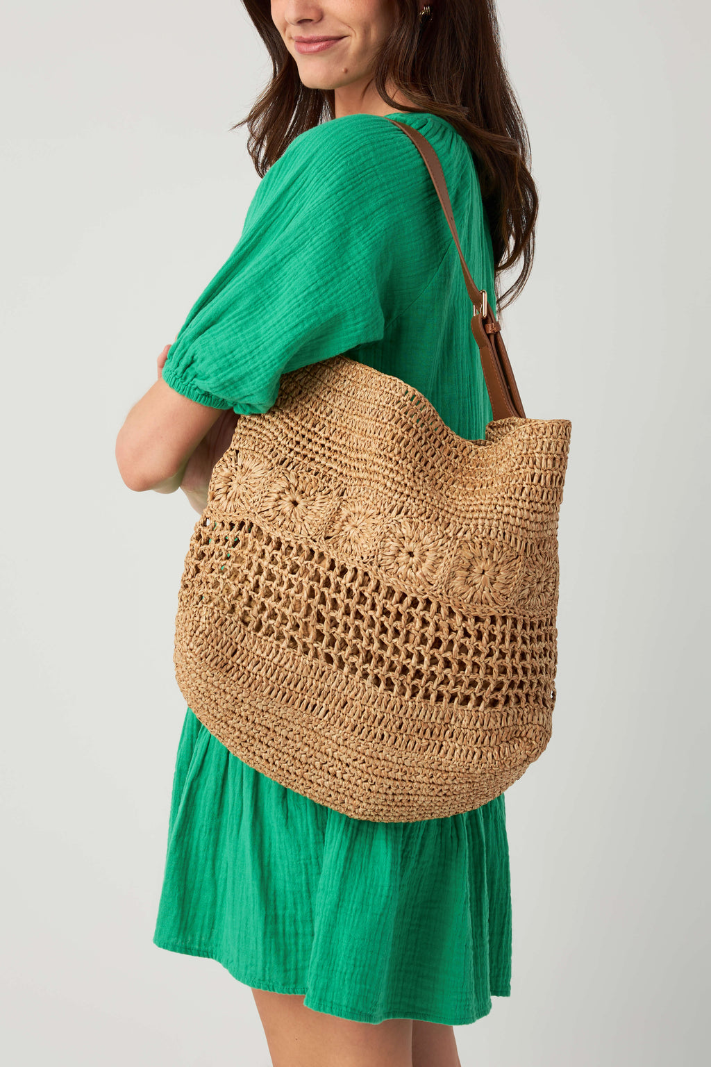 Natural woven hobo bag with braided texture and short shoulder strap