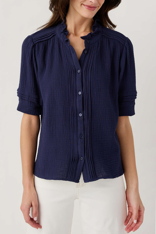 Navy gauze short sleeve top with button front and ruffled collar details