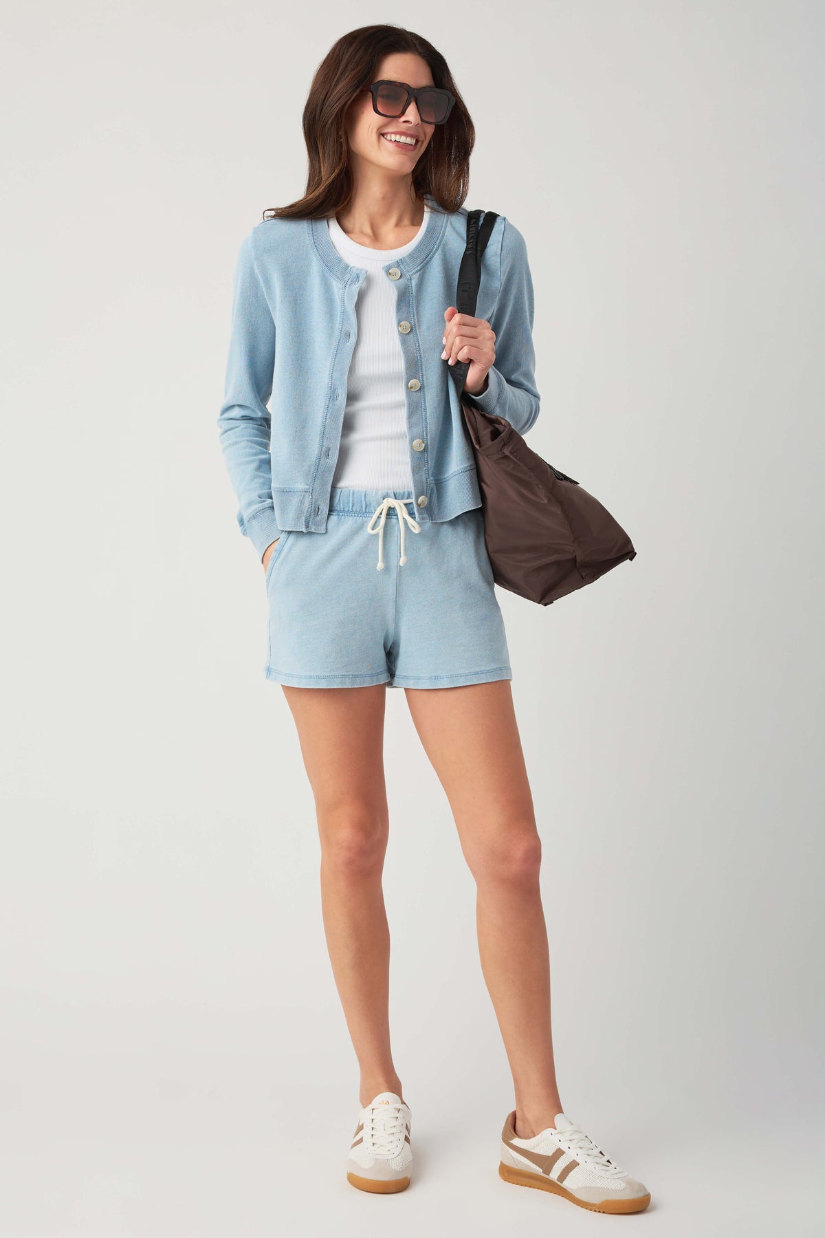 Women’s light blue knit denim shorts, drawstring waist and side pockets