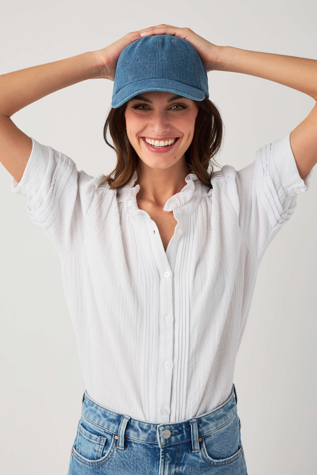 Blue denim baseball cap with curved brim and adjustable strapback