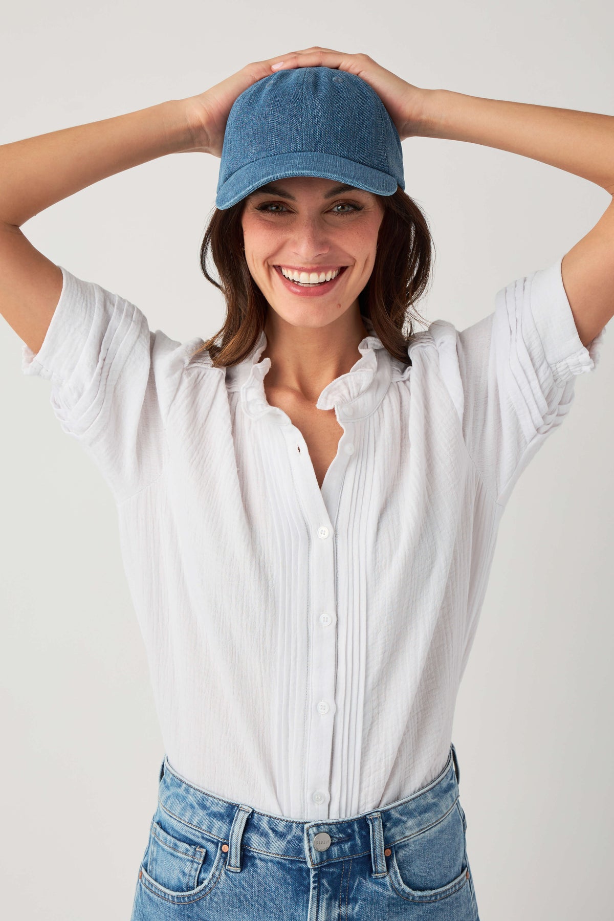 Blue denim baseball cap with curved brim and adjustable strapback