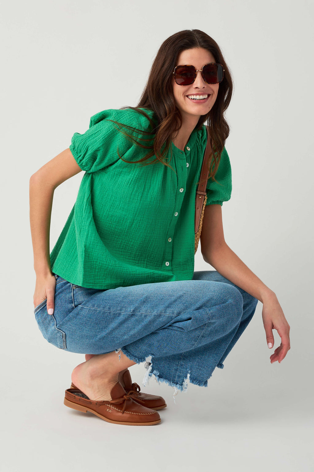Kelly green gauze button-up top with short puff sleeves and button front