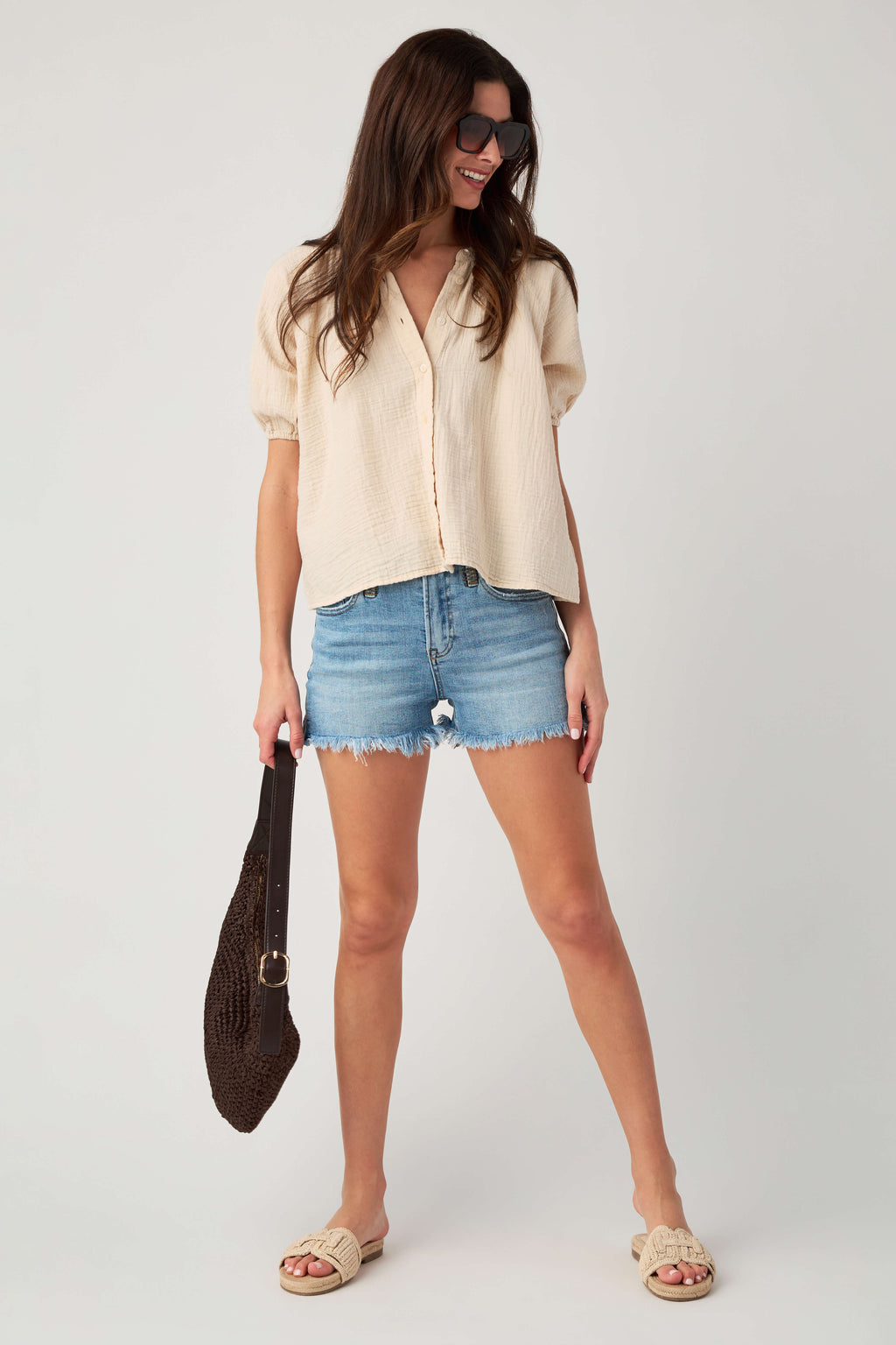 Natural gauze button-up top with short puff sleeves and front button placket