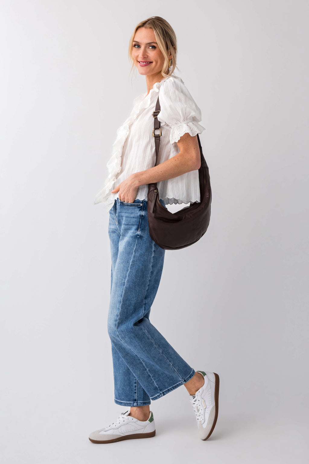 High-rise barrel jeans in medium wash blue, side view with wide cropped leg