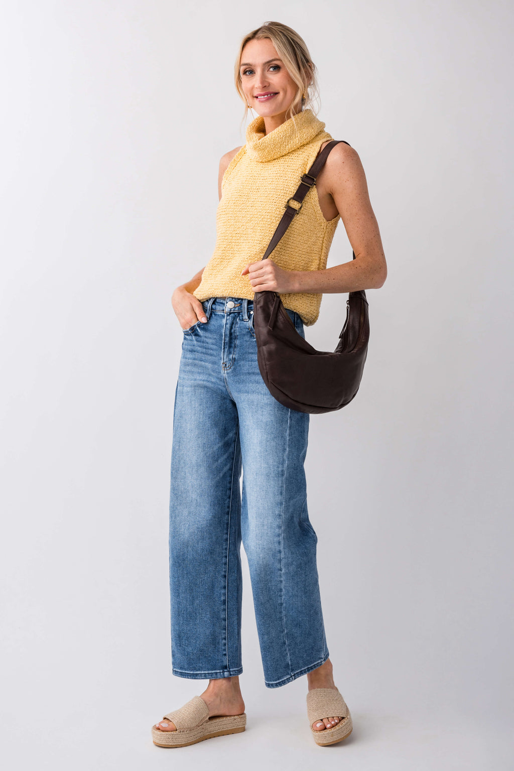 High-rise barrel jeans in medium wash blue, front view with relaxed barrel fit