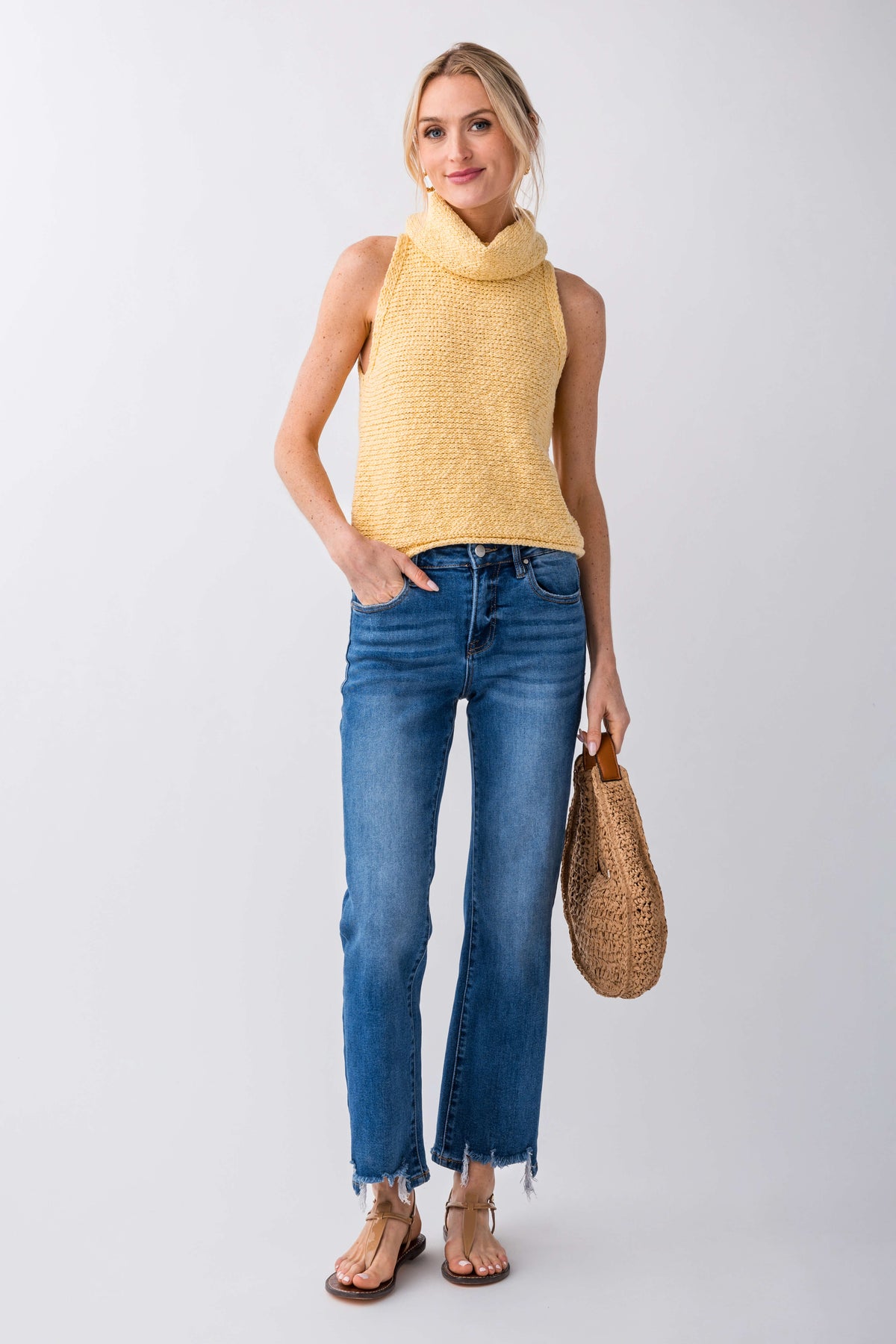 Yellow sleeveless high-neck knit top with textured look and sleeveless cut