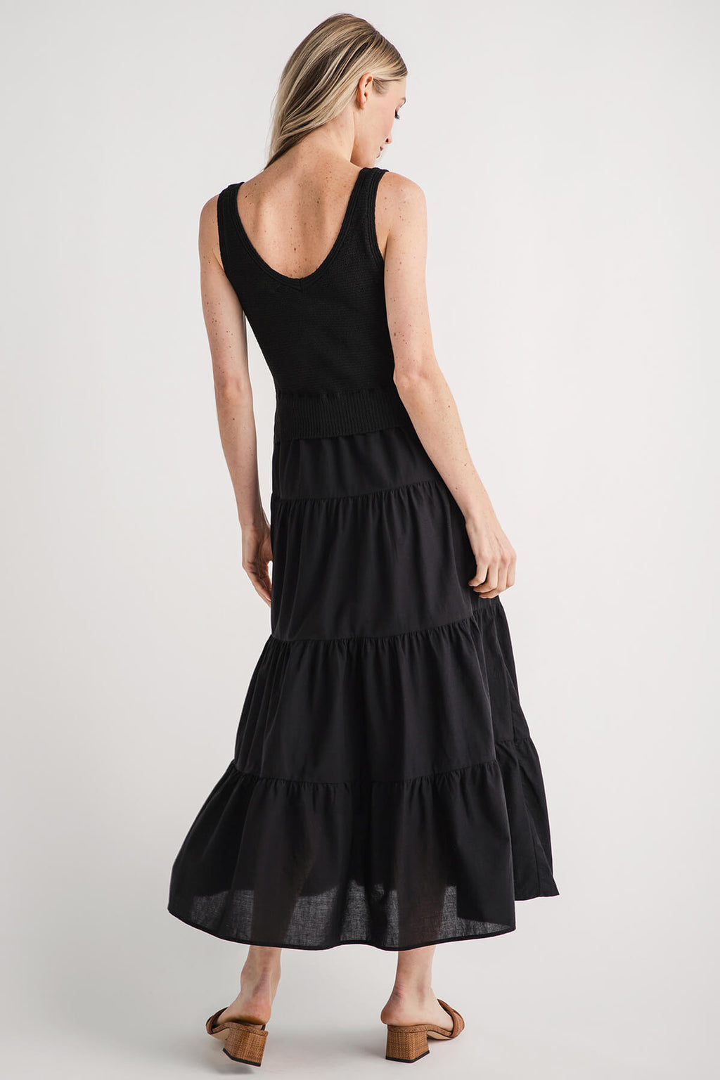 Black sleeveless tiered maxi dress with open scoop back