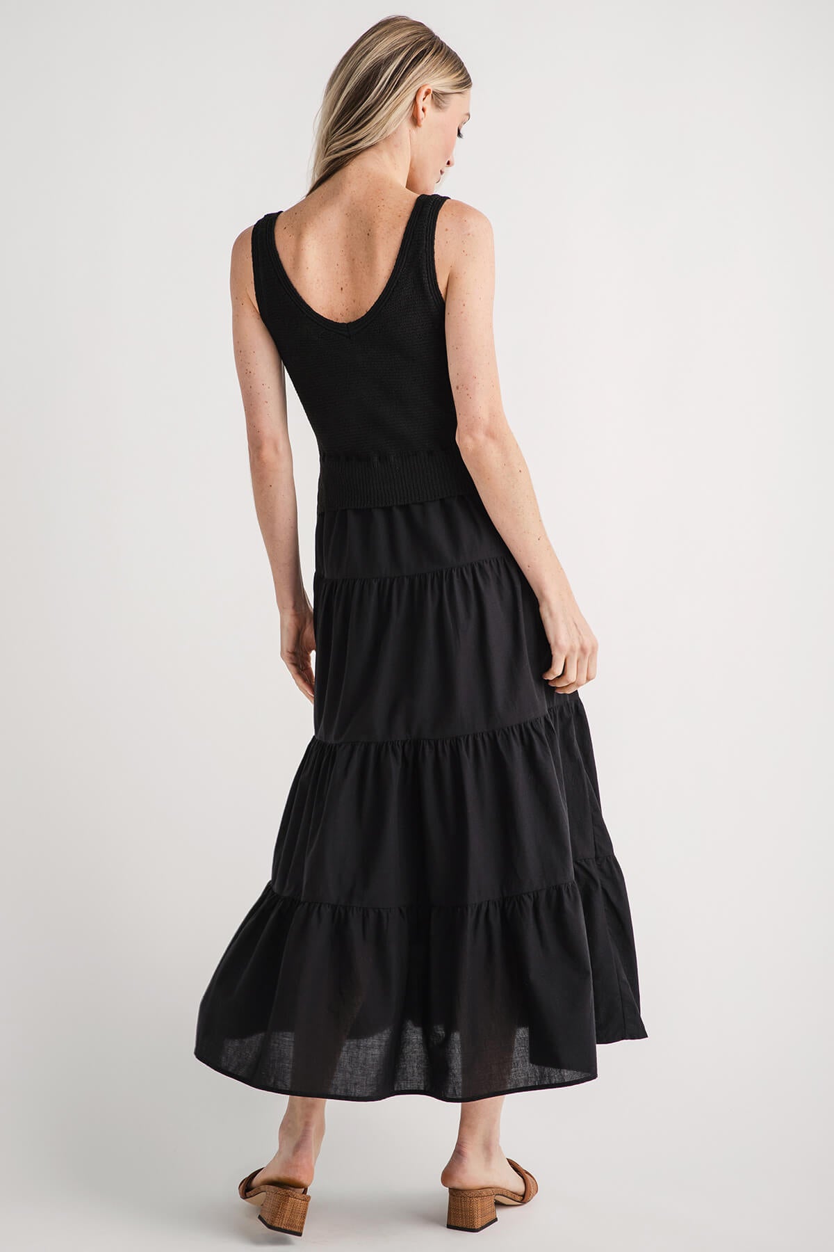 Black sleeveless tiered maxi dress with open scoop back