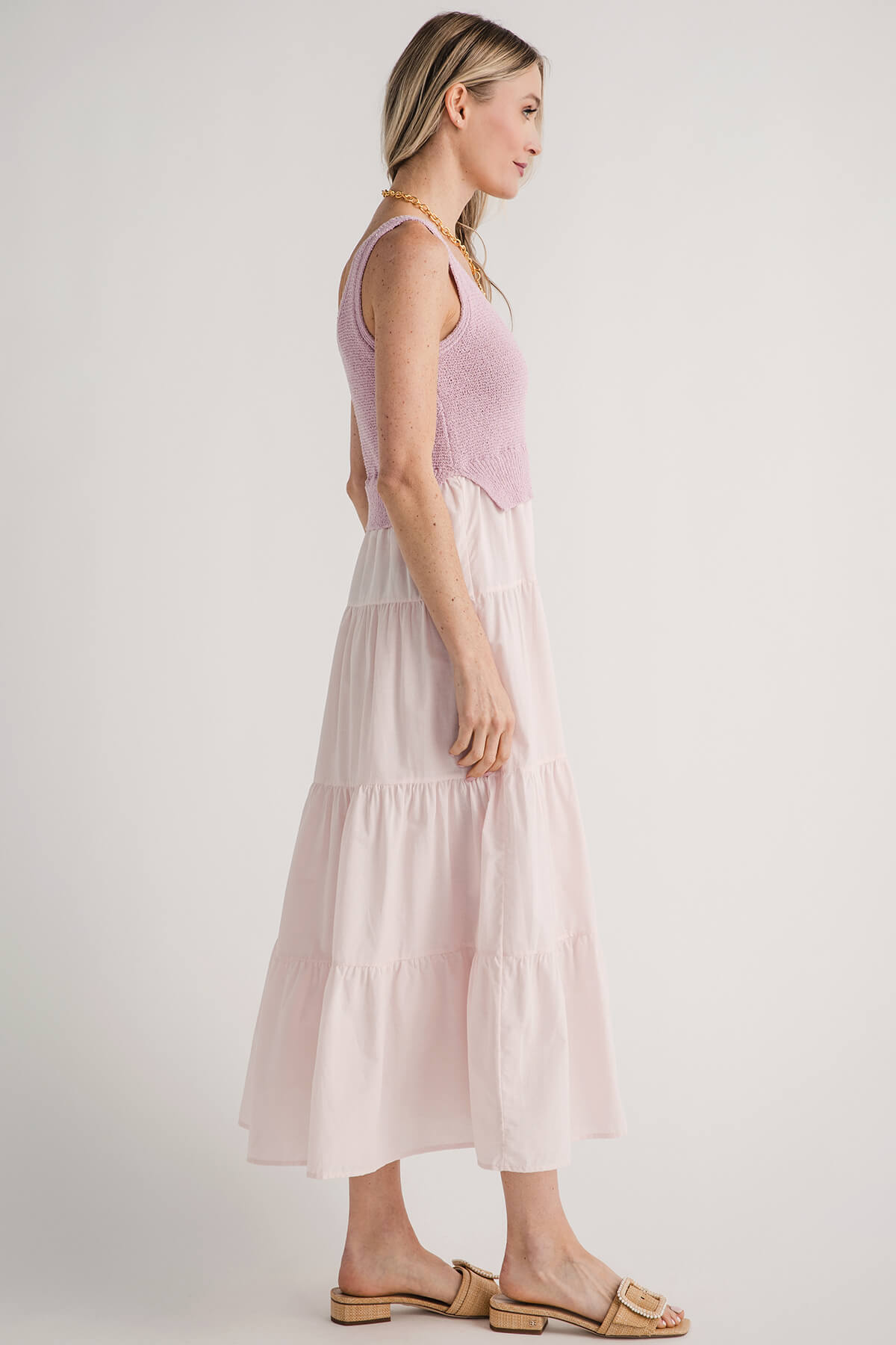 Lilac knit sleeveless maxi dress, side view with tiered skirt