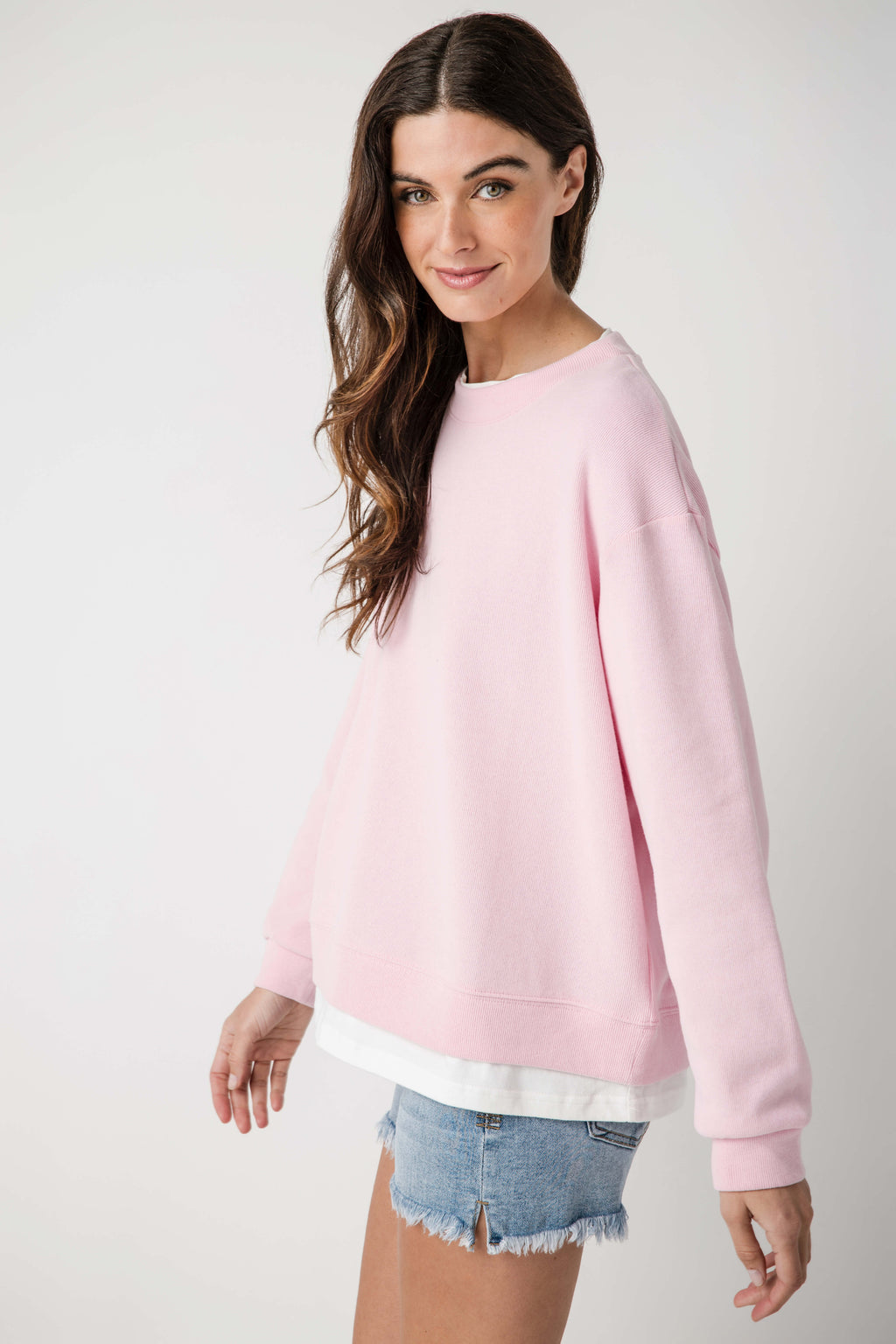 Pink crew pullover with crew neck and long sleeves