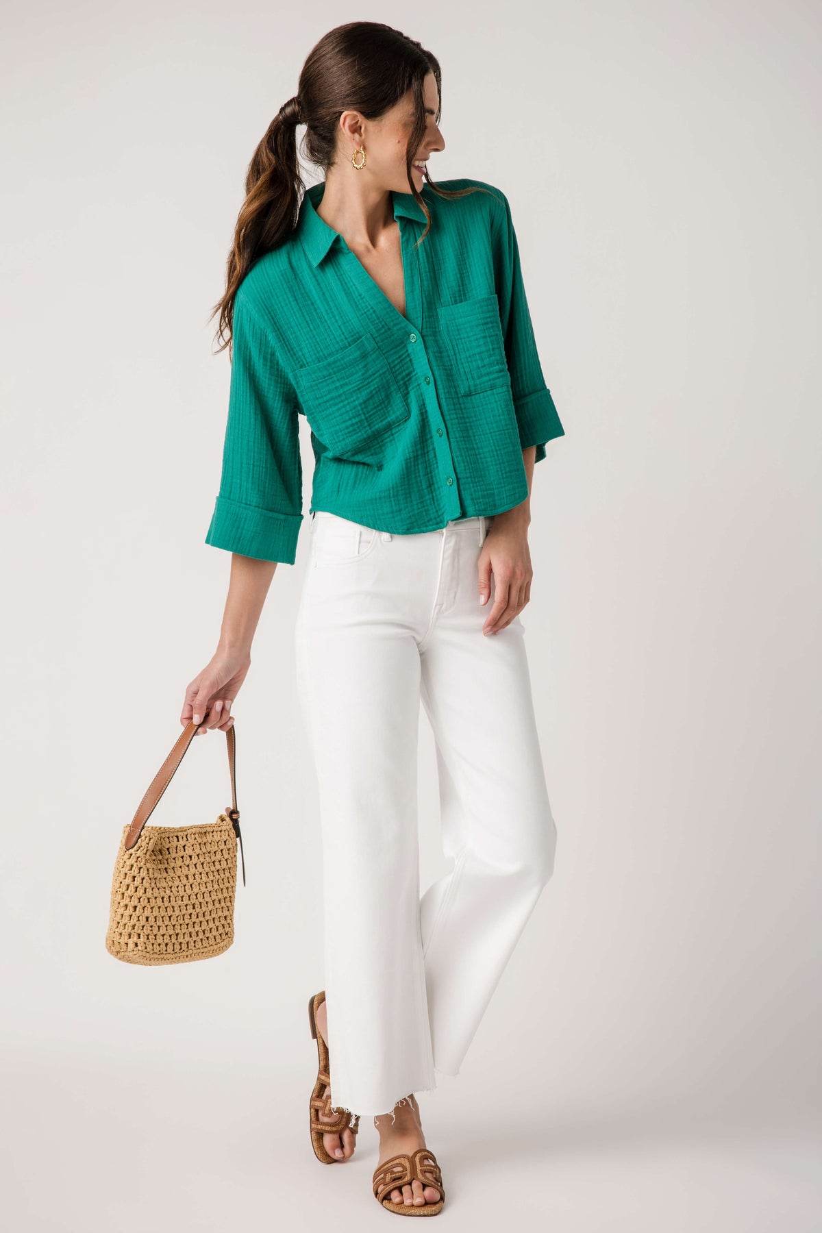 Rainforest green button-front shirt with chest pockets, rolled sleeves, and relaxed fit