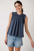 Navy sleeveless smocked birdseye top with gathered high ruffle yoke