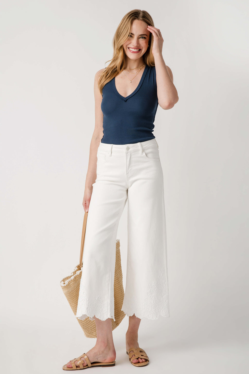 Deep Iris sleeveless V-neck tank top with slim straps and fitted silhouette