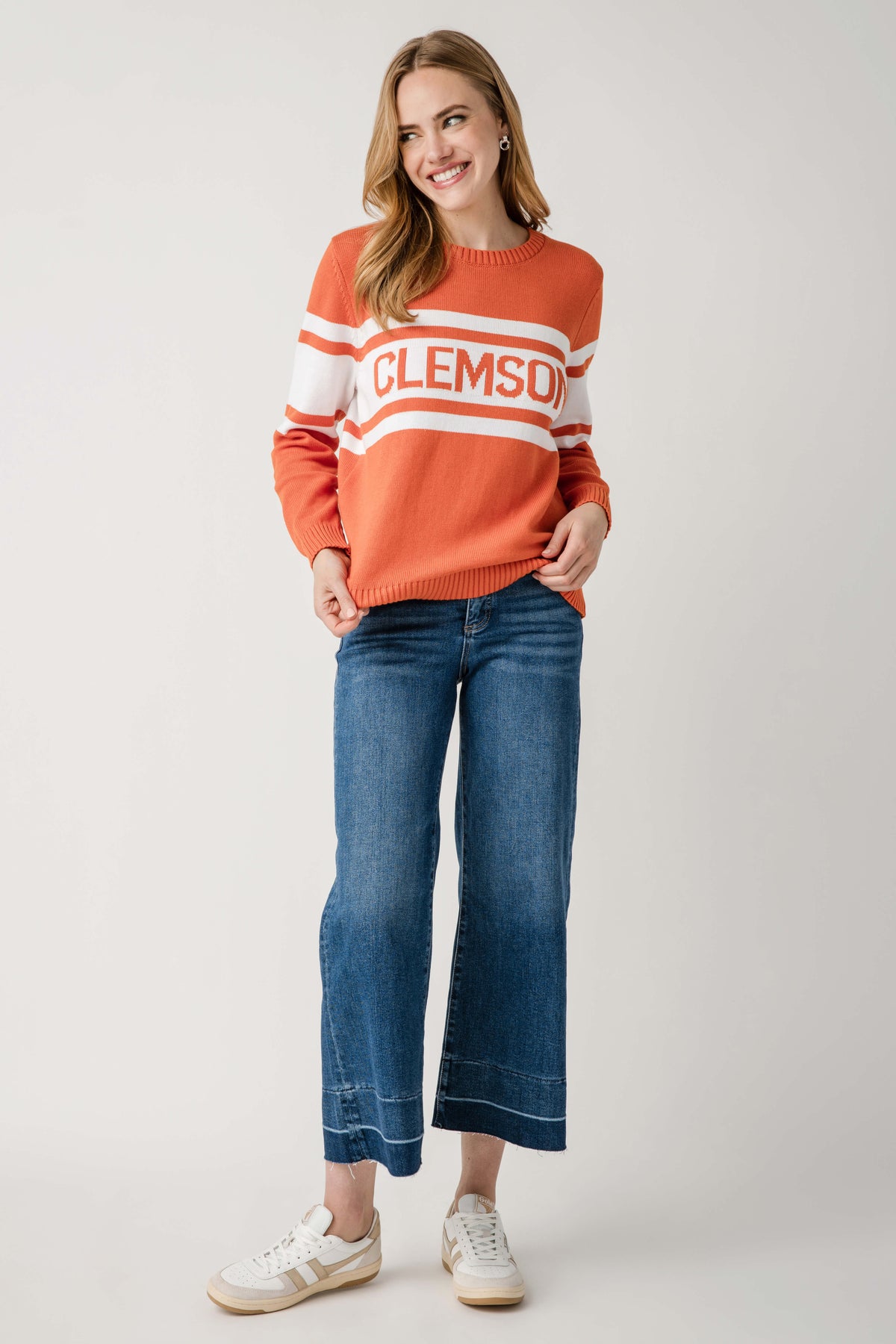 Orange vintage campus sweater with Clemson logo, crew neck, and white striped bands