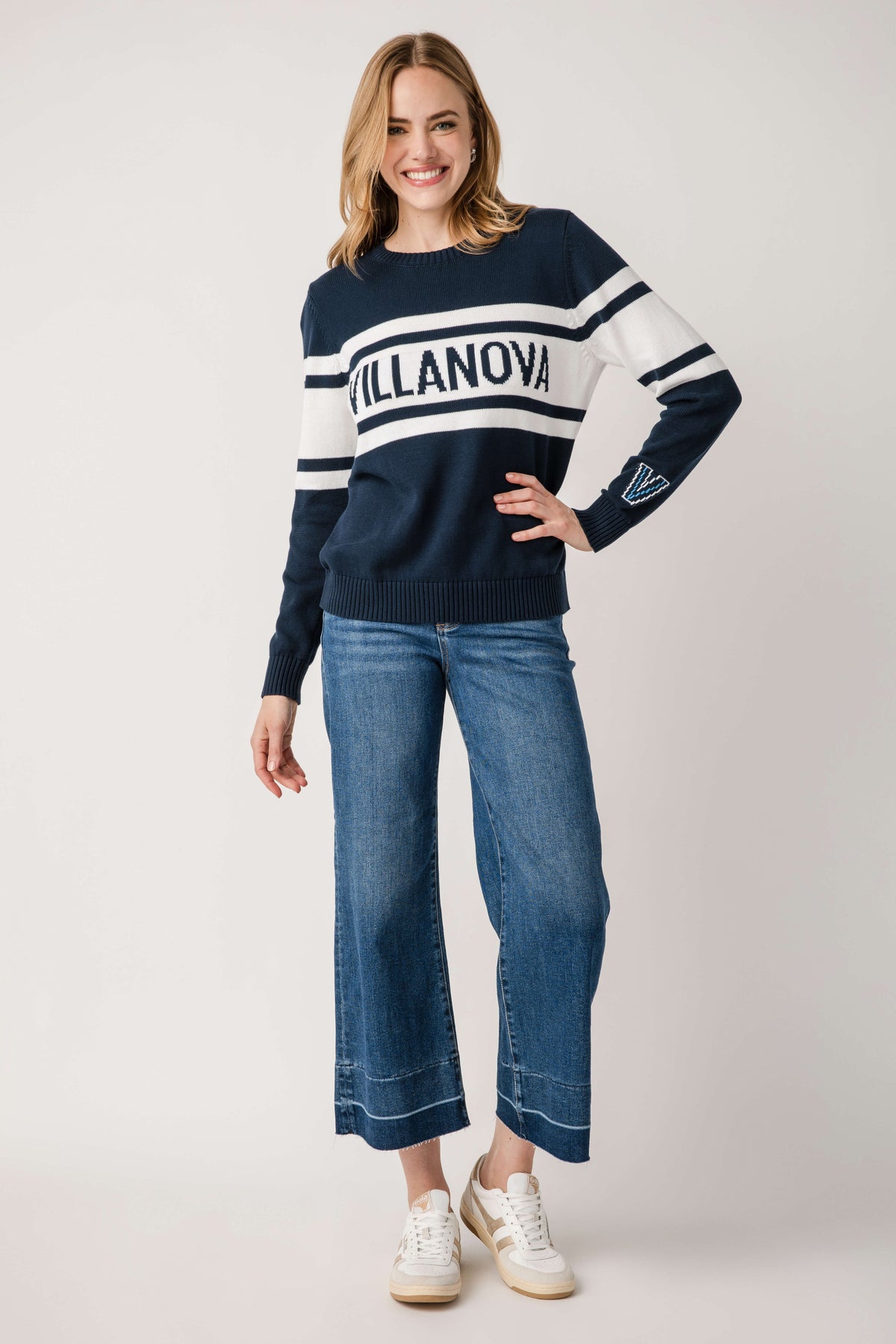 Navy vintage Villanova crewneck sweater with white chest text and striped sleeves