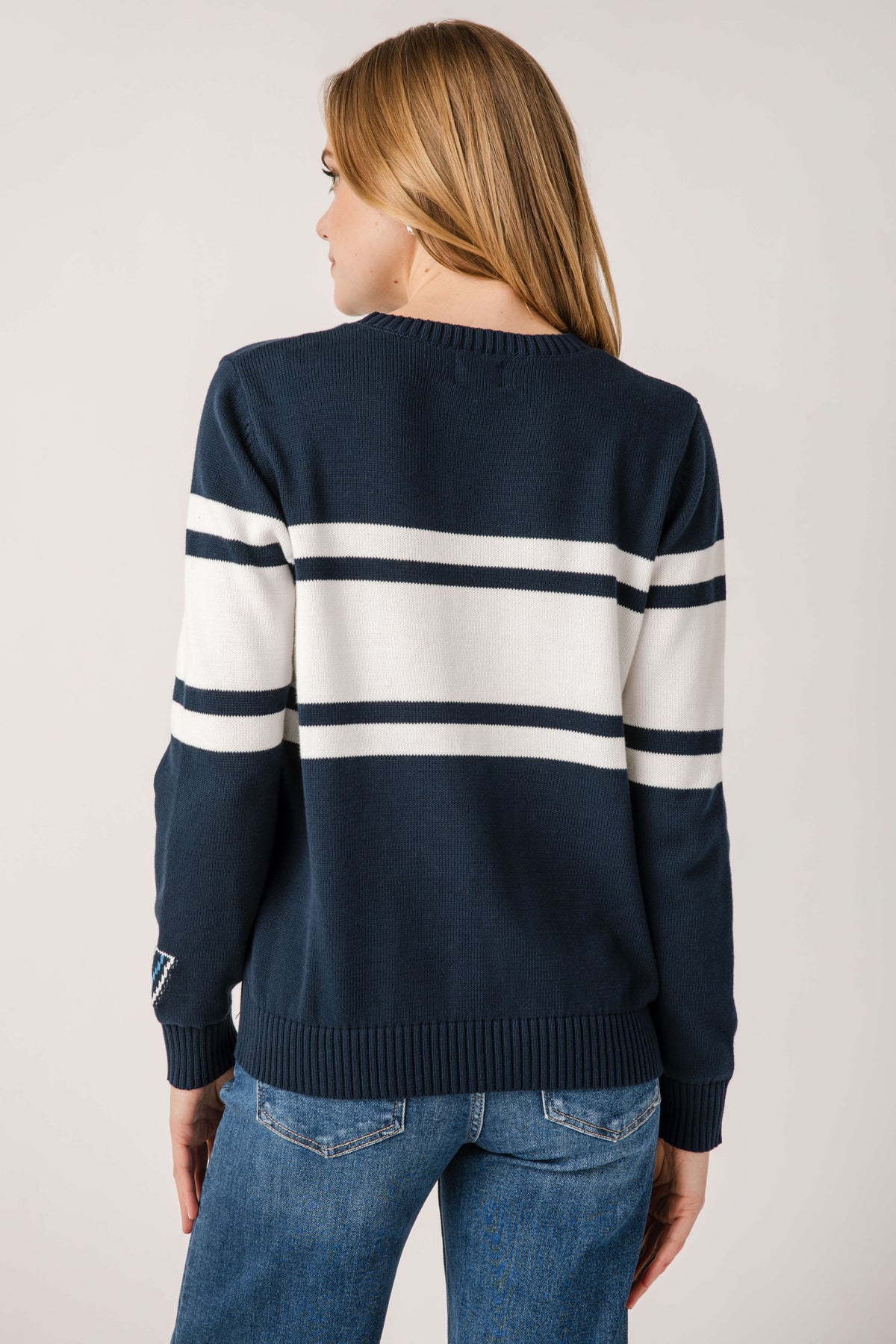 Back view of navy Villanova vintage sweater with horizontal white stripe bands