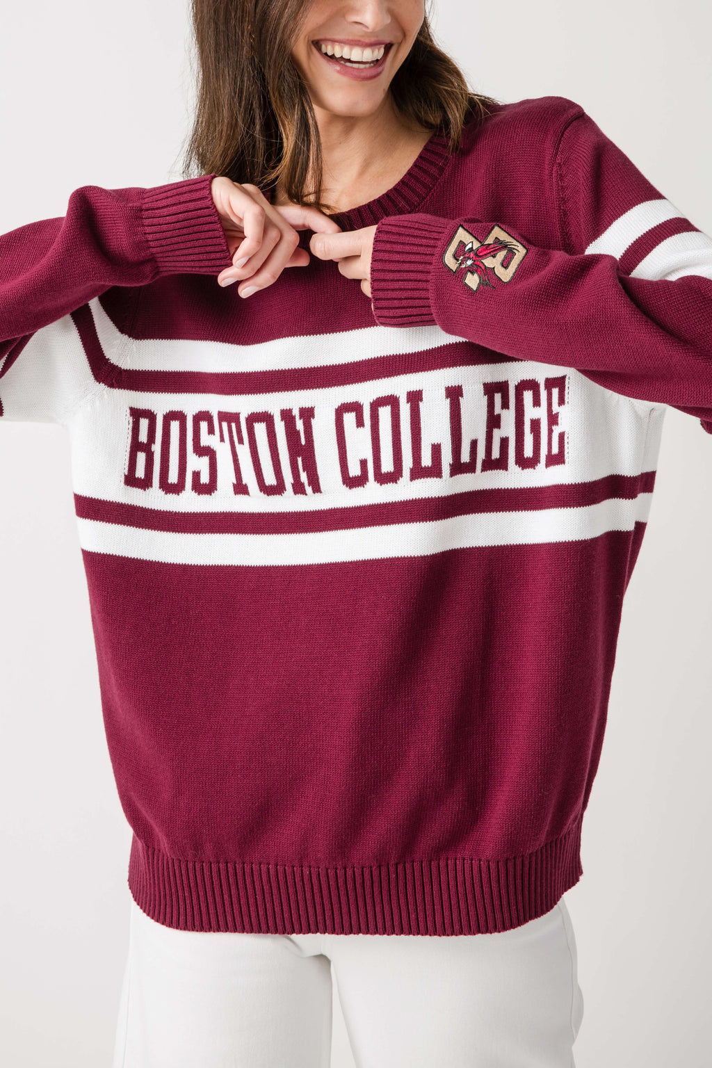 Burgundy Boston College striped crewneck sweater with front logo and ribbed hem