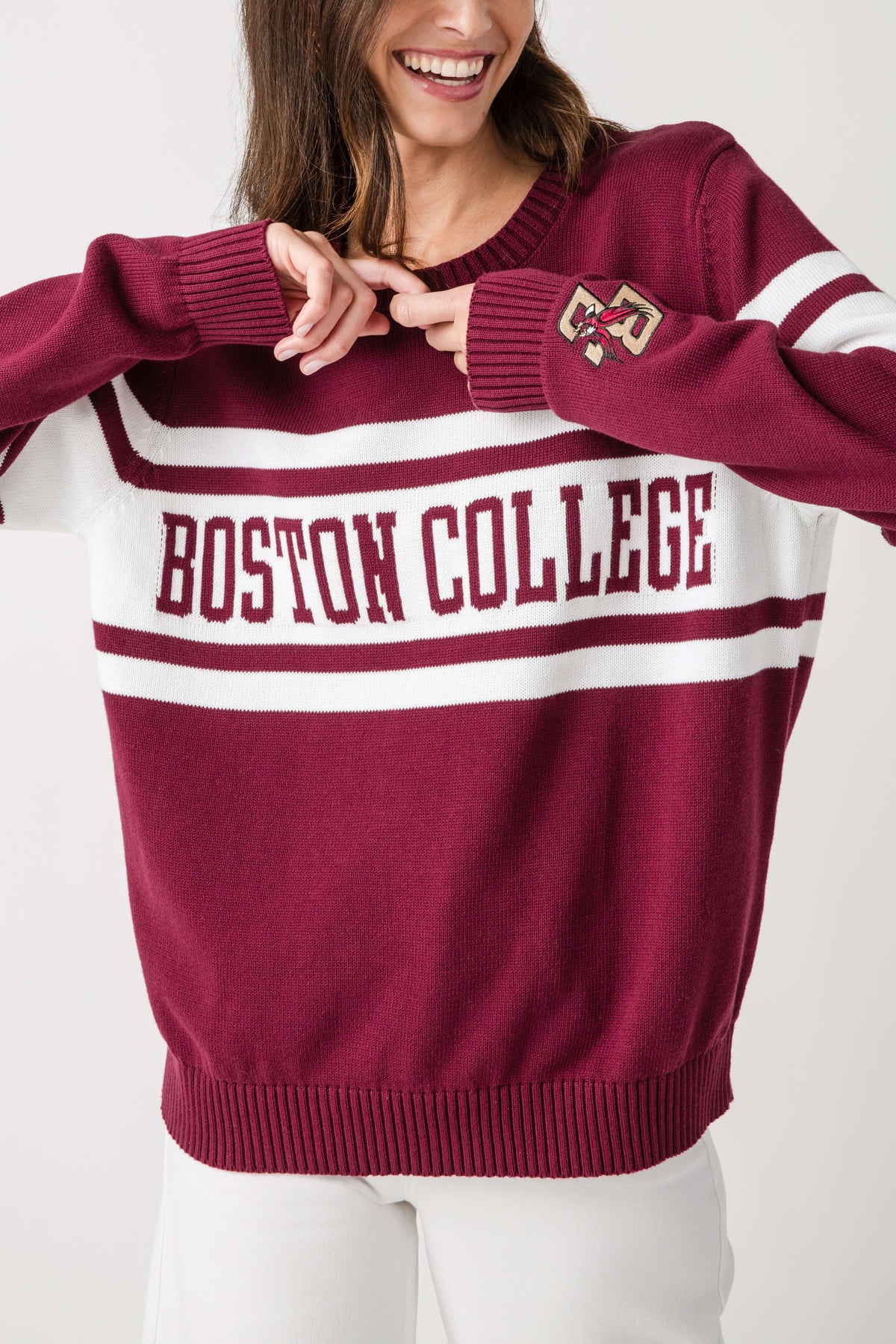 Burgundy Boston College striped crewneck sweater with front logo and ribbed hem