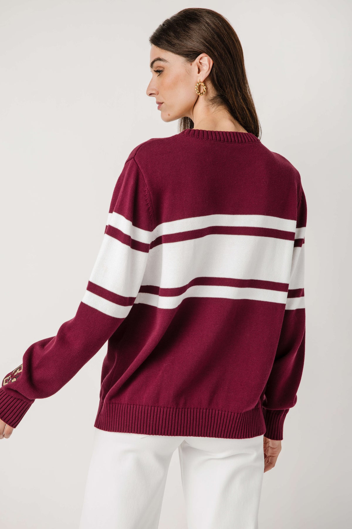 Burgundy Boston College striped sweater from back view with ribbed hem and cuffs