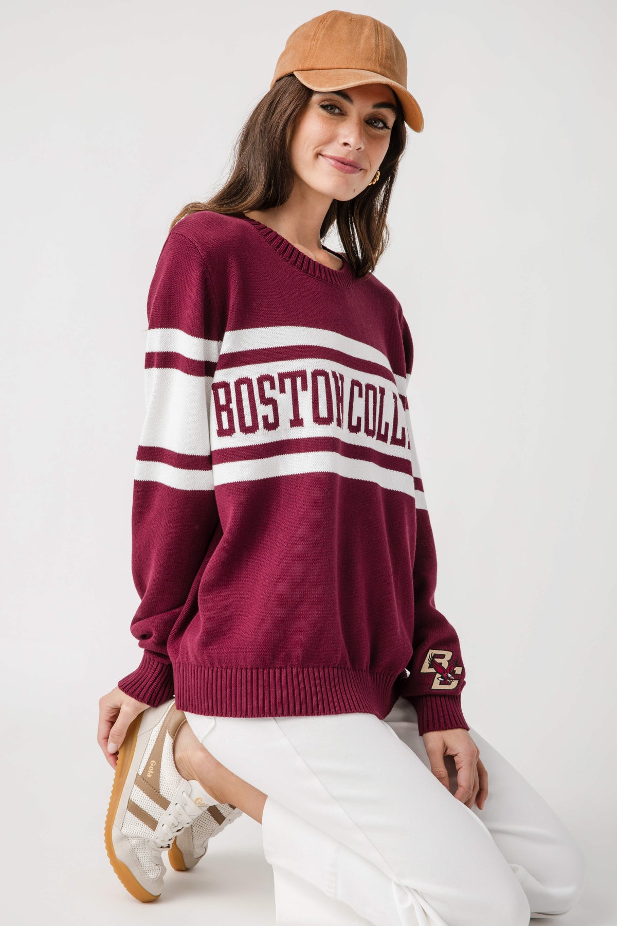 Burgundy Boston College crewneck sweater with white stripe logo band and ribbed cuffs
